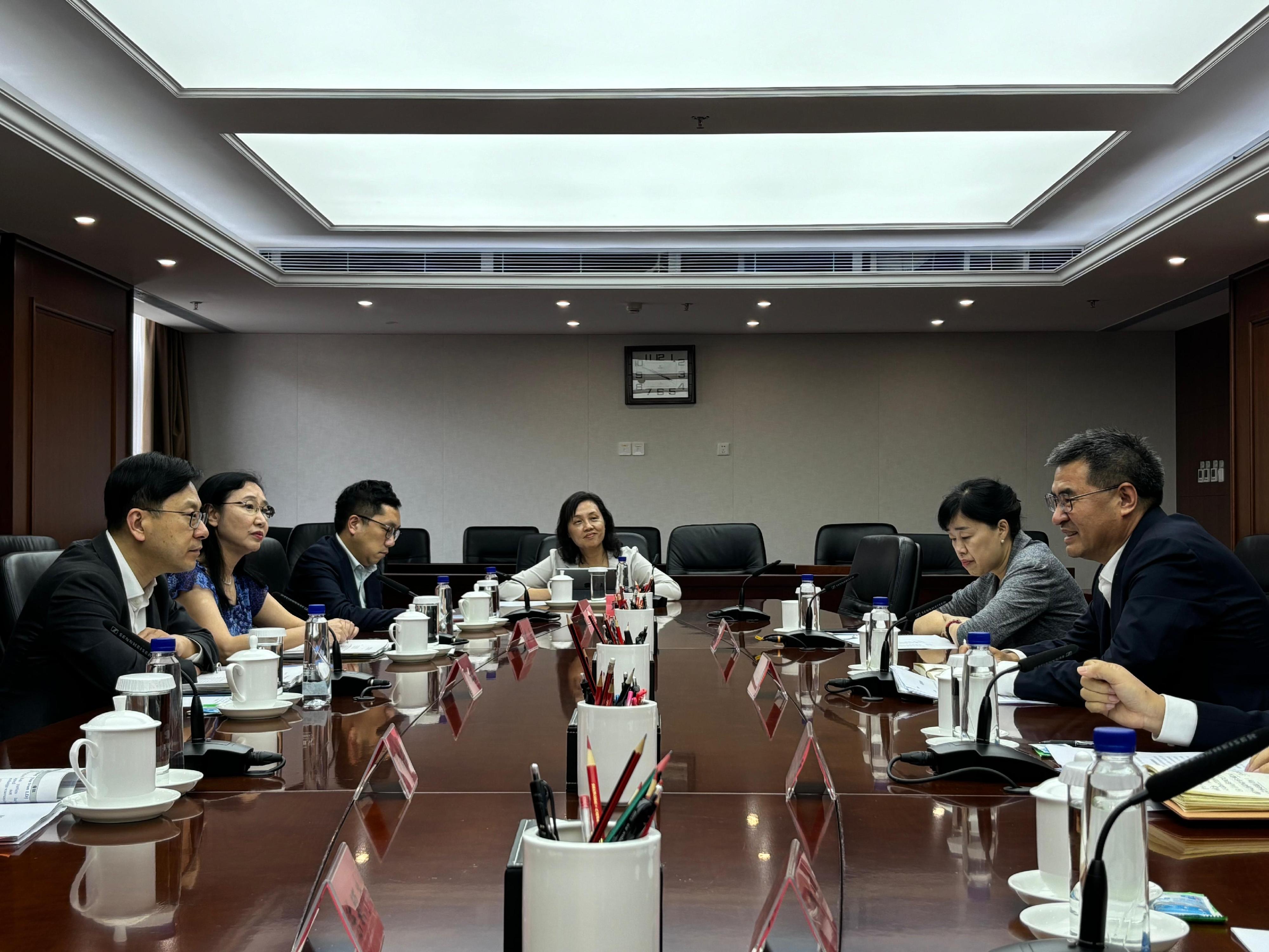 The Secretary for Labour and Welfare, Mr Chris Sun, today (August 26) began his Beijing visit. The Permanent Secretary for Labour and Welfare, Ms Alice Lau, also joined the visit. Photo shows Mr Sun (first left) calling on the Director General of General office (Department of International Cooperation) of Ministry of Civil Affairs, Mr Liu Xitang (first right), to learn more about the latest policies in areas including addressing population ageing and enhancing elderly care services. Looking on is Ms Lau (second left).