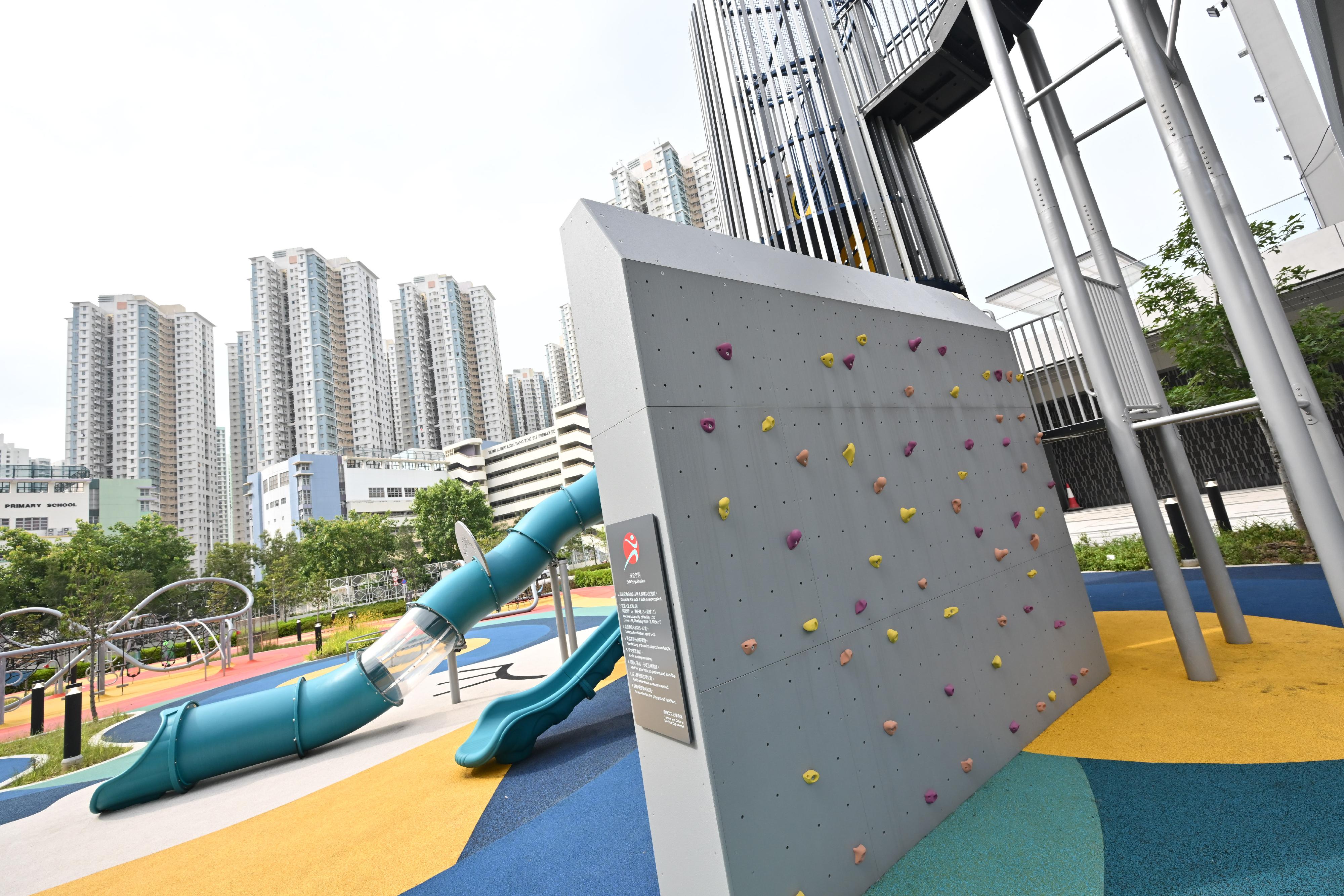 Tin Sau Road Playground will open for public use tomorrow (August 28). Photo shows the 3-metre-high climbing wall at the playground.