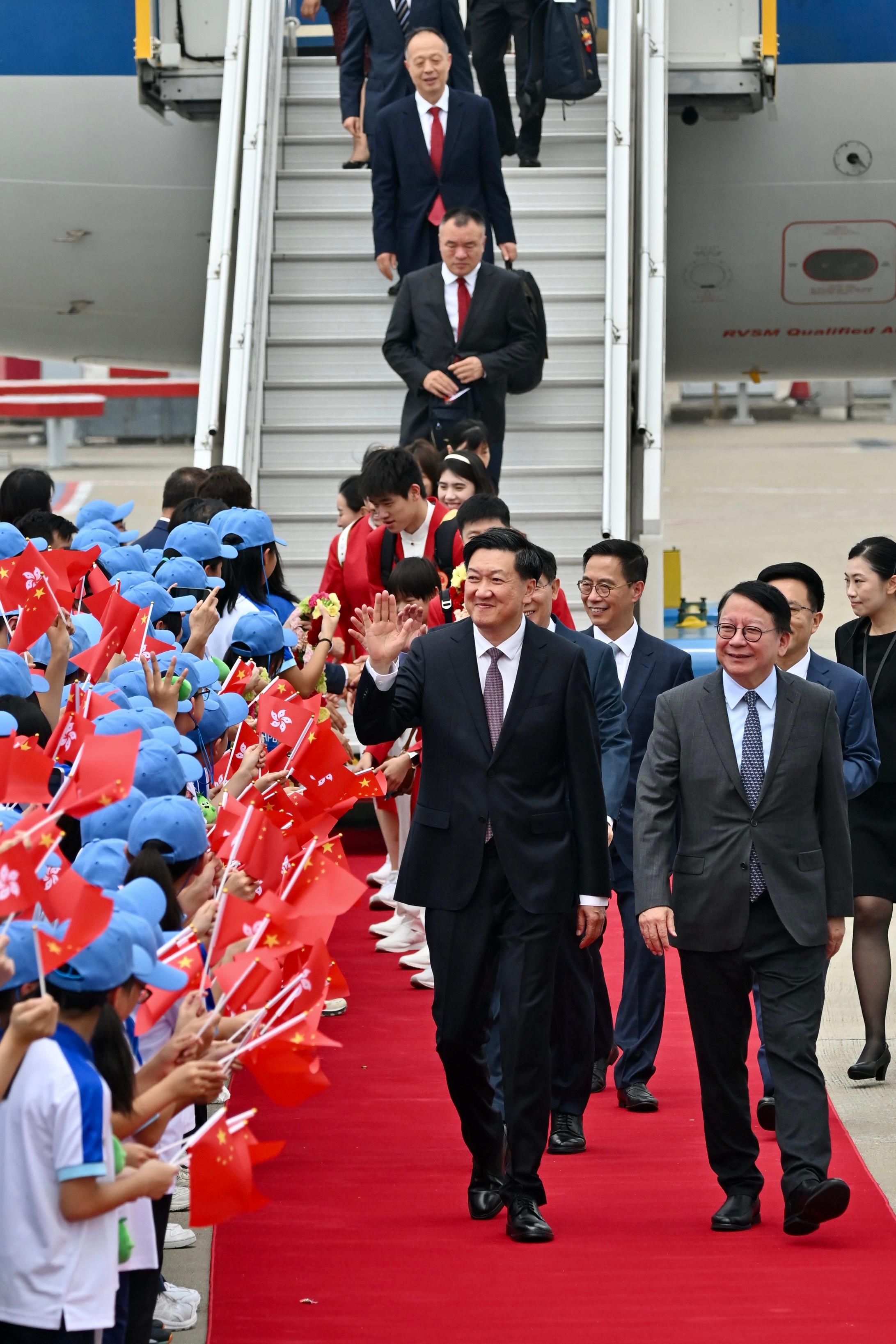 The 2024 Paris Olympic Games Mainland Olympians delegation arrives in Hong Kong today (August 29) for a three-day visit. Photo shows the Chief Secretary for Administration, Mr Chan Kwok-ki (first right), greeting the Head of Delegation - Director of the General Administration of Sport of China, Mr Gao Zhidan (second right), at Hong Kong International Airport.