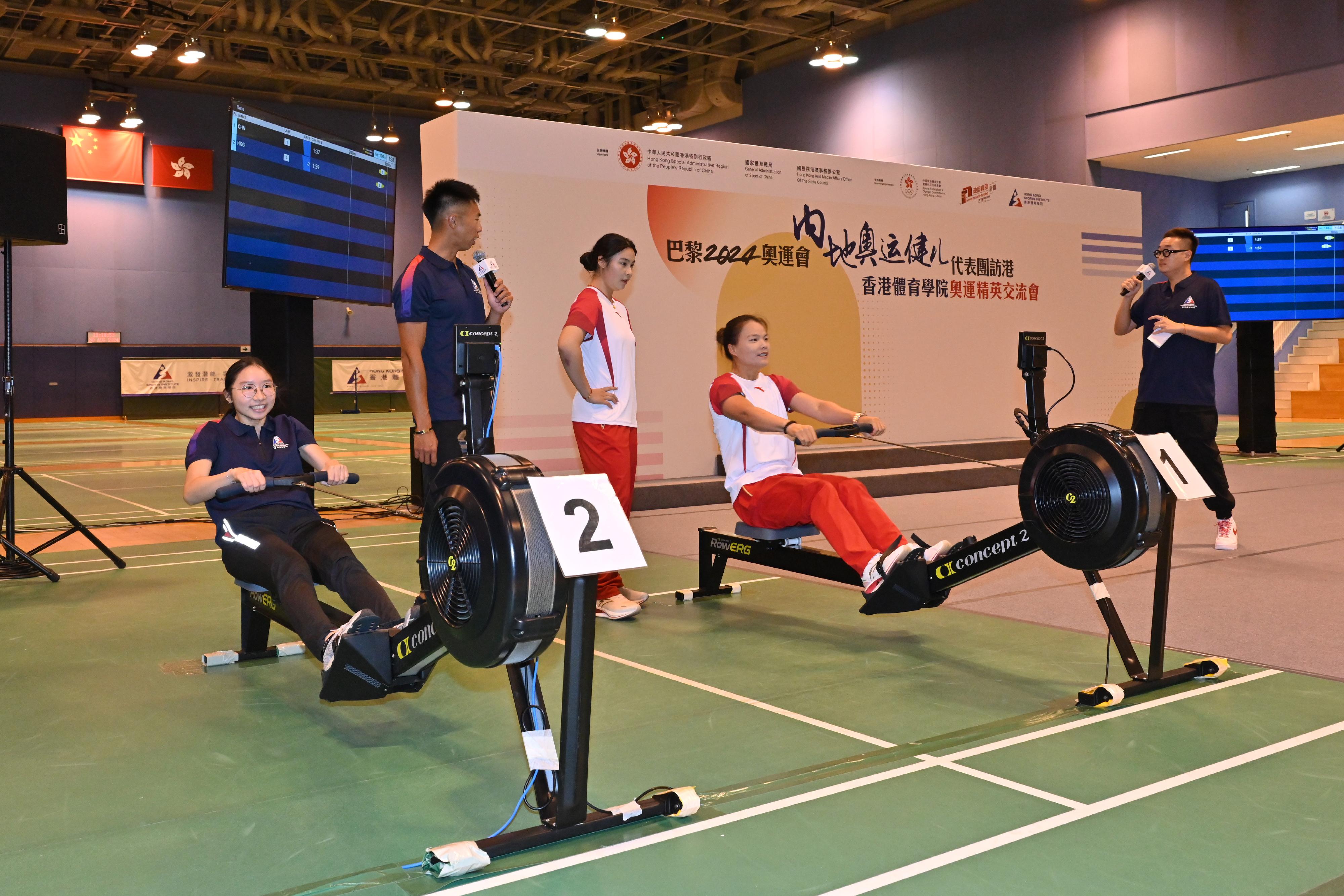 The 2024 Paris Olympic Games Mainland Olympians delegation continued their visit to Hong Kong today (August 30). Photo shows members of the delegation visiting the Hong Kong Sports Institute and interacting with local elite athletes.