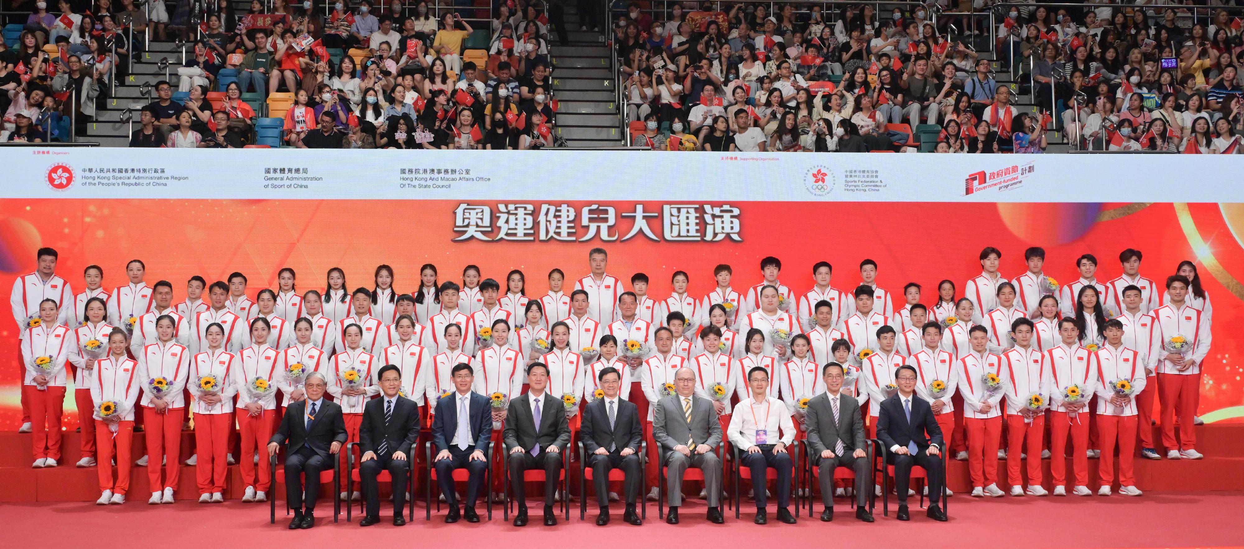 The Chief Executive, Mr John Lee, attended the Mainland Olympians Gala Show today (August 30). Photo shows (first row, from left) the President of the Sports Federation & Olympic Committee of Hong Kong, China, Mr Timothy Fok; the Secretary General of the Liaison Office of the Central People's Government in the Hong Kong Special Administrative Region (HKSAR), Mr Wang Songmiao; the Deputy Head of the 2024 Paris Olympic Games Mainland Olympians Delegation (Delegation) - Deputy Director of the General Administration of Sport of China (GASC), Mr Zhou Jinqiang; the Head of Delegation - Director of the GASC, Mr Gao Zhidan; Mr Lee; the Director of the Liaison Office of the Central People's Government in the HKSAR, Mr Zheng Yanxiong; the Deputy Director of Bureau IV of the Hong Kong and Macao Affairs Office of the State Council, Mr Chen Wei; the Secretary for Culture, Sports and Tourism, Mr Kevin Yeung; and the Director of Leisure and Cultural Services, Mr Vincent Liu, with members of the Delegation.