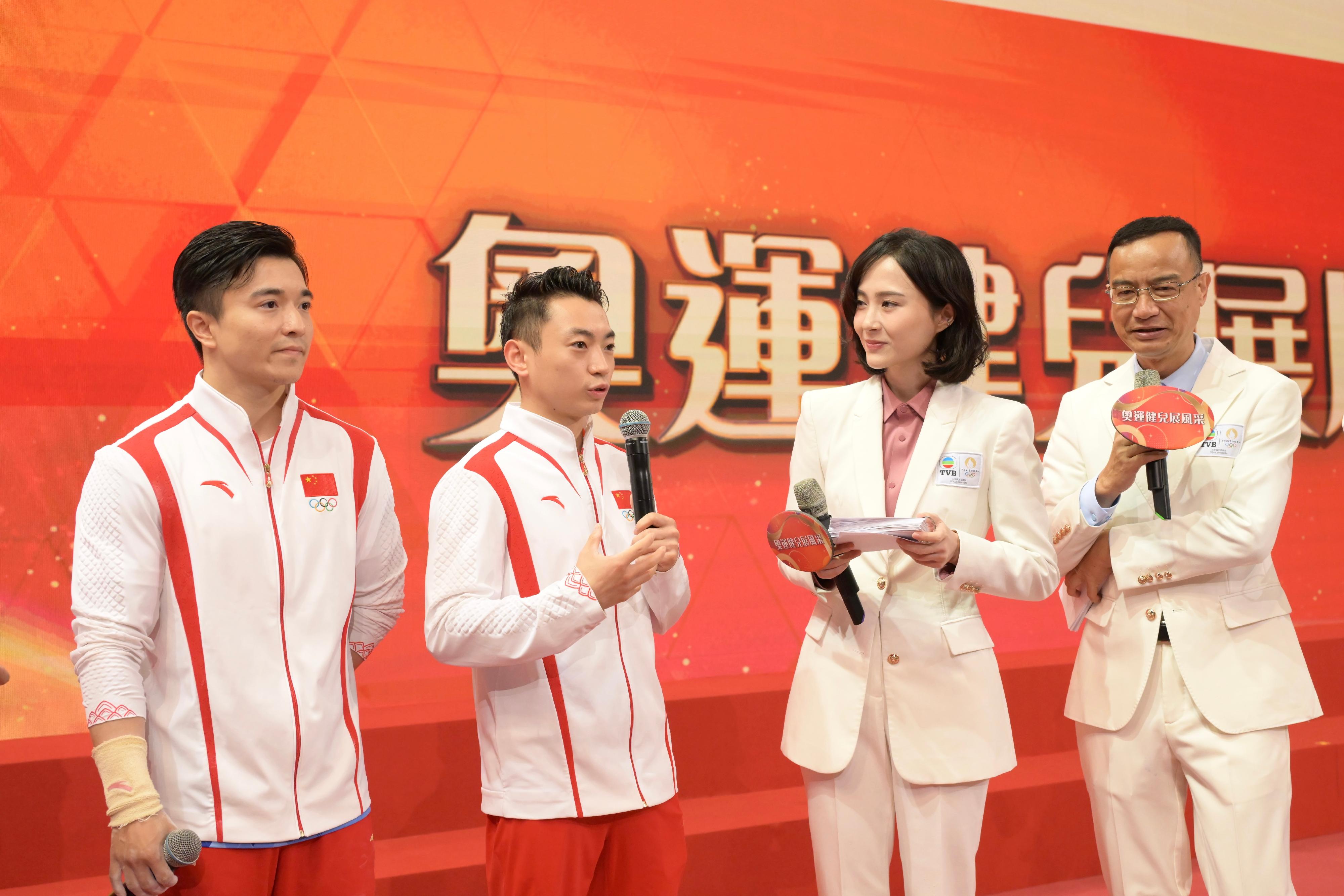 The 2024 Paris Olympic Games Mainland Olympians delegation attended the Sports Demonstrations by Mainland Olympians at Queen Elizabeth Stadium in Wan Chai this morning (August 31). Photo shows the gymnastics athletes of the national team, Liu Yang (first left) and Zou Jingyuan (second left) sharing their competition experiences.