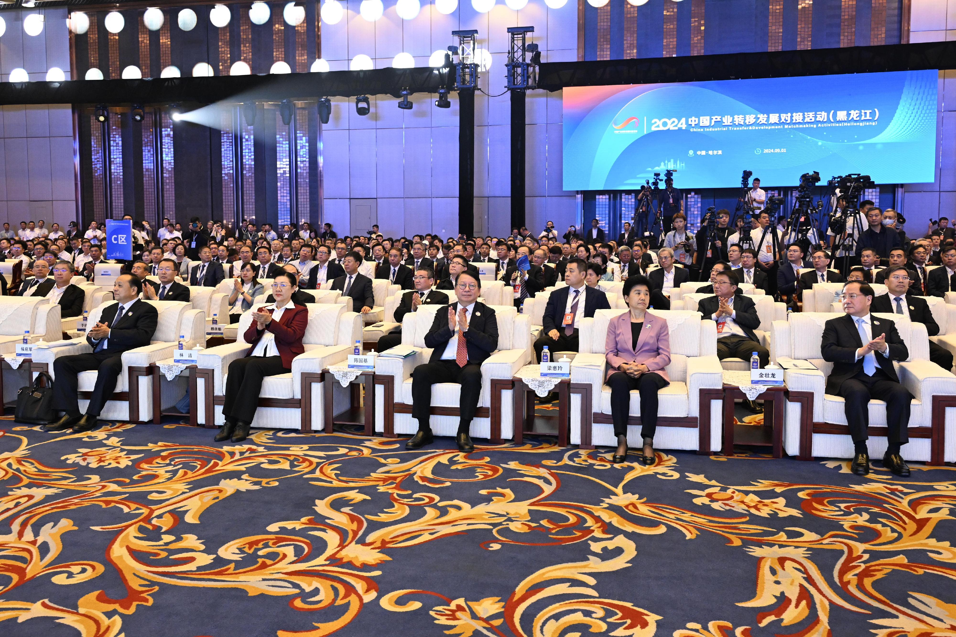 The Chief Secretary for Administration, Mr Chan Kwok-ki, continued his visit to Harbin today (September 1). Photo shows Mr Chan (first row, third right); the Minister of Industry and Information Technology, Mr Jin Zhuanglong (first row, first right); the Governor of Heilongjiang Province, Ms Liang Huiling (first row, second right) and other guests at the opening ceremony of 2024 China Industrial Transfer & Development Matchmaking Activities (Heilongjiang).
