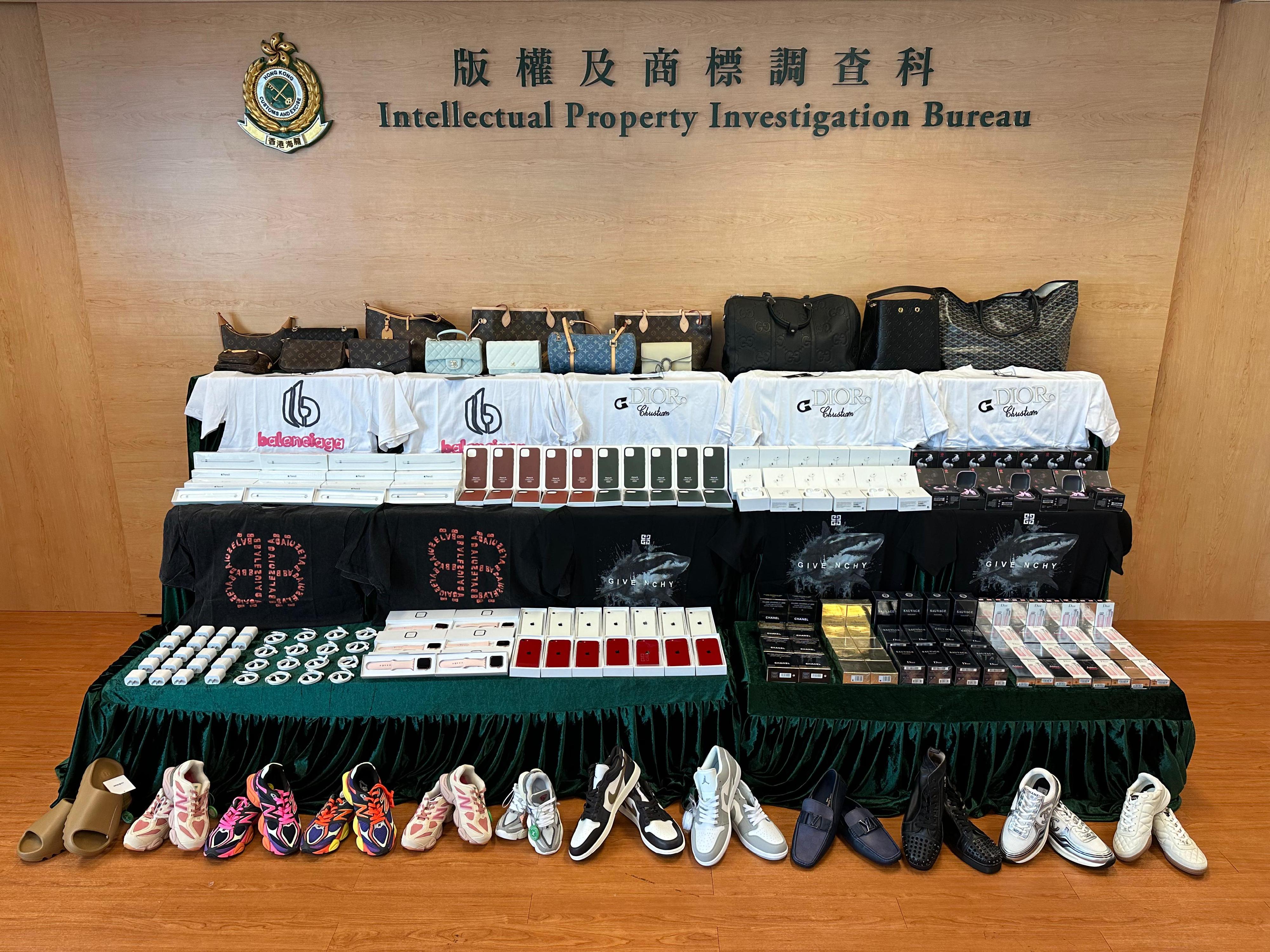 Hong Kong Customs conducted a two-week joint enforcement operation with the Mainland and Macao Customs from August 19 to 30, during which inspection of goods across the three places and destined for North America, Europe, and countries and regions along the Belt and Road Initiative was stepped up, with a view to combating cross-boundary counterfeiting activities among the three places and with goods destined for overseas countries. During the operation, Hong Kong Customs detected 28 cases and seized about 25 000 items of suspected counterfeit goods, including mobile phones and accessories, watches, personal care products and footwear, with a total estimated market value of about $5.8 million. Photo shows some of suspected counterfeit goods seized.