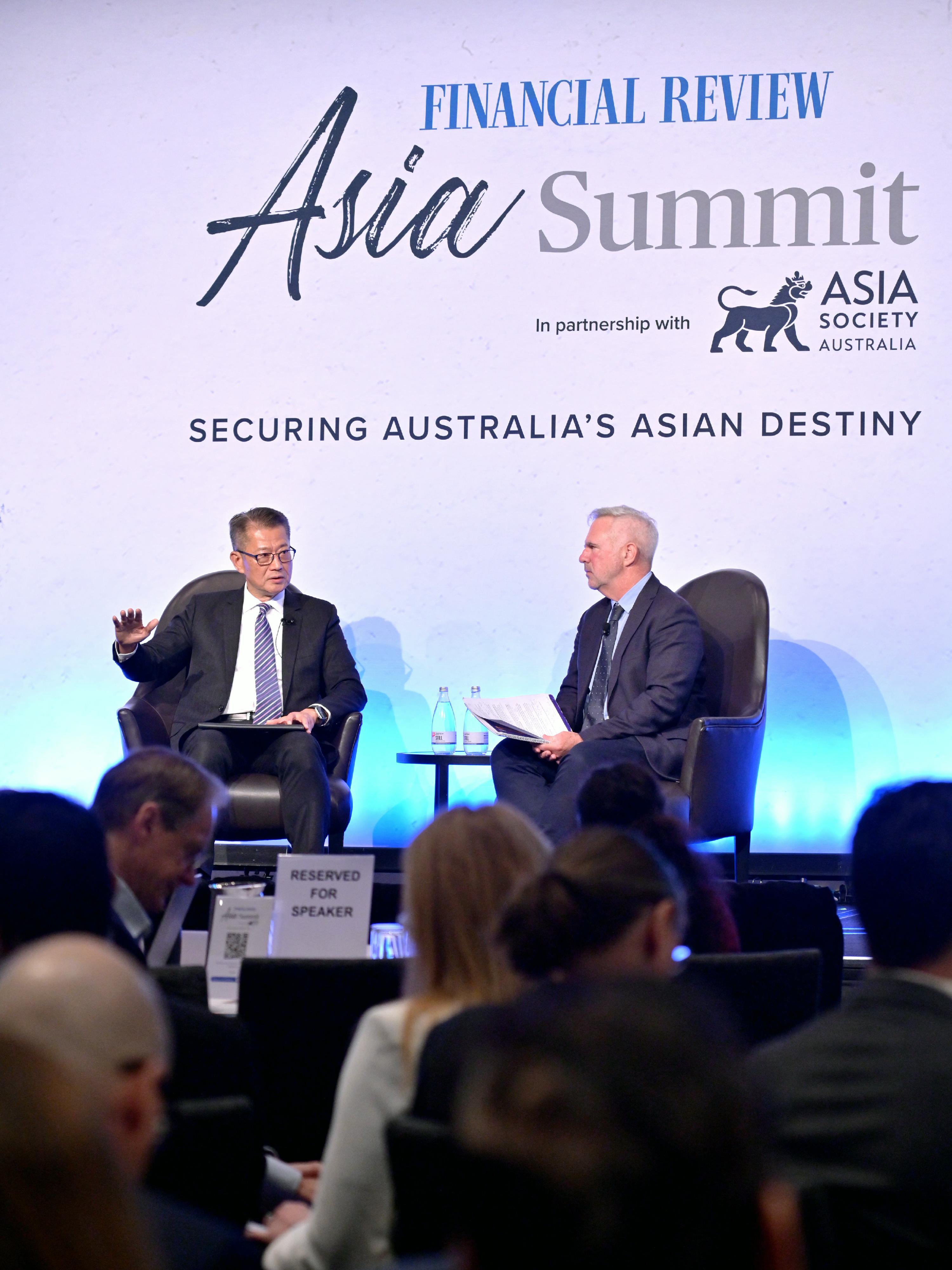 The Financial Secretary, Mr Paul Chan, attended the Asia Summit organised by the Australian Financial Review, in partnership with the Asia Society Australia, in Melbourne, Australia today (September 3, Melbourne time). Photo shows Mr Chan (left) responding to questions by the moderator. 