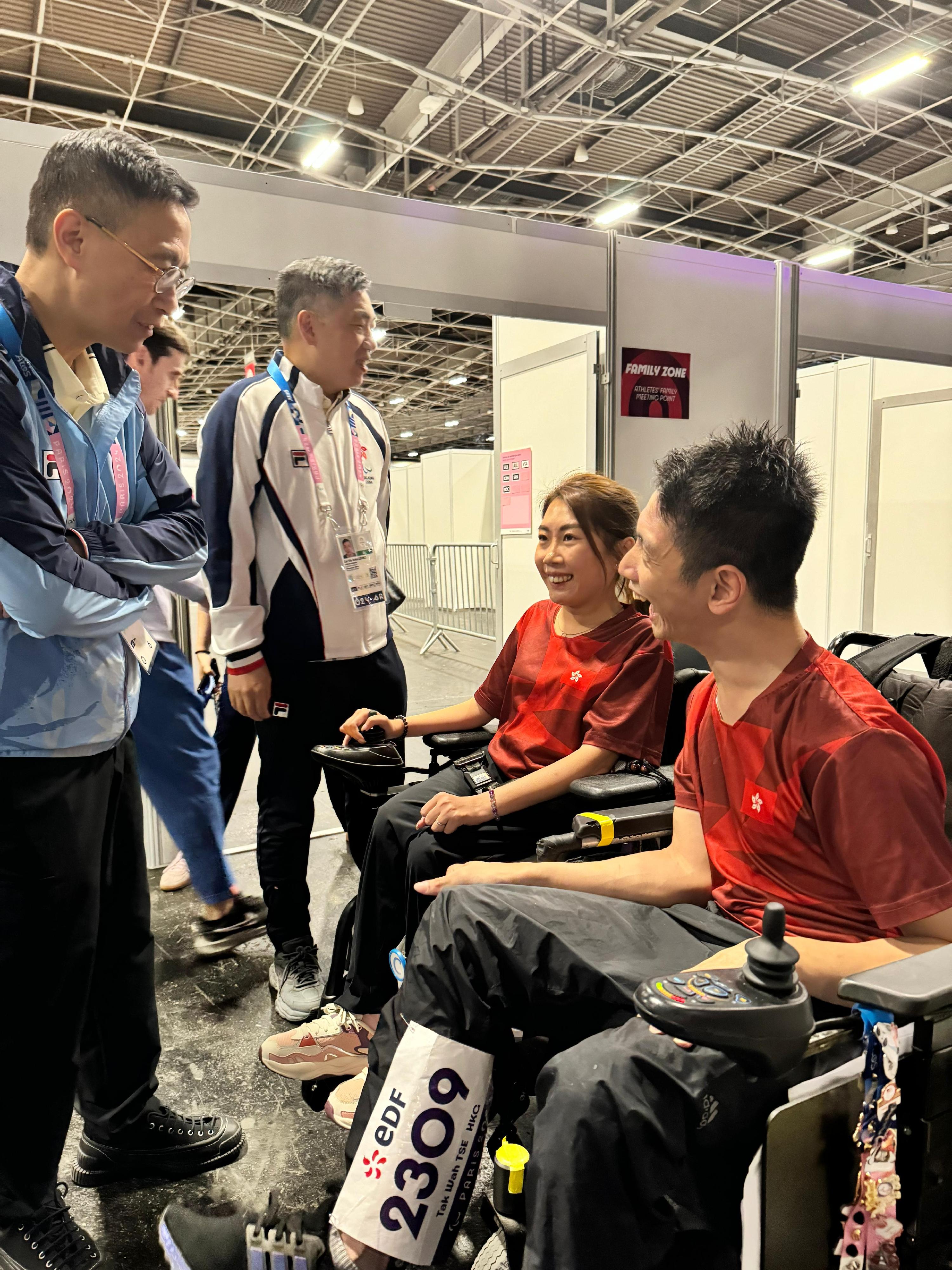 The Secretary for Culture, Sports and Tourism, Mr Kevin Yeung (first left), went to the boccia competition venue of the 2024 Paris Paralympic Games yesterday (September 4, Paris time) and met with Hong Kong athletes.