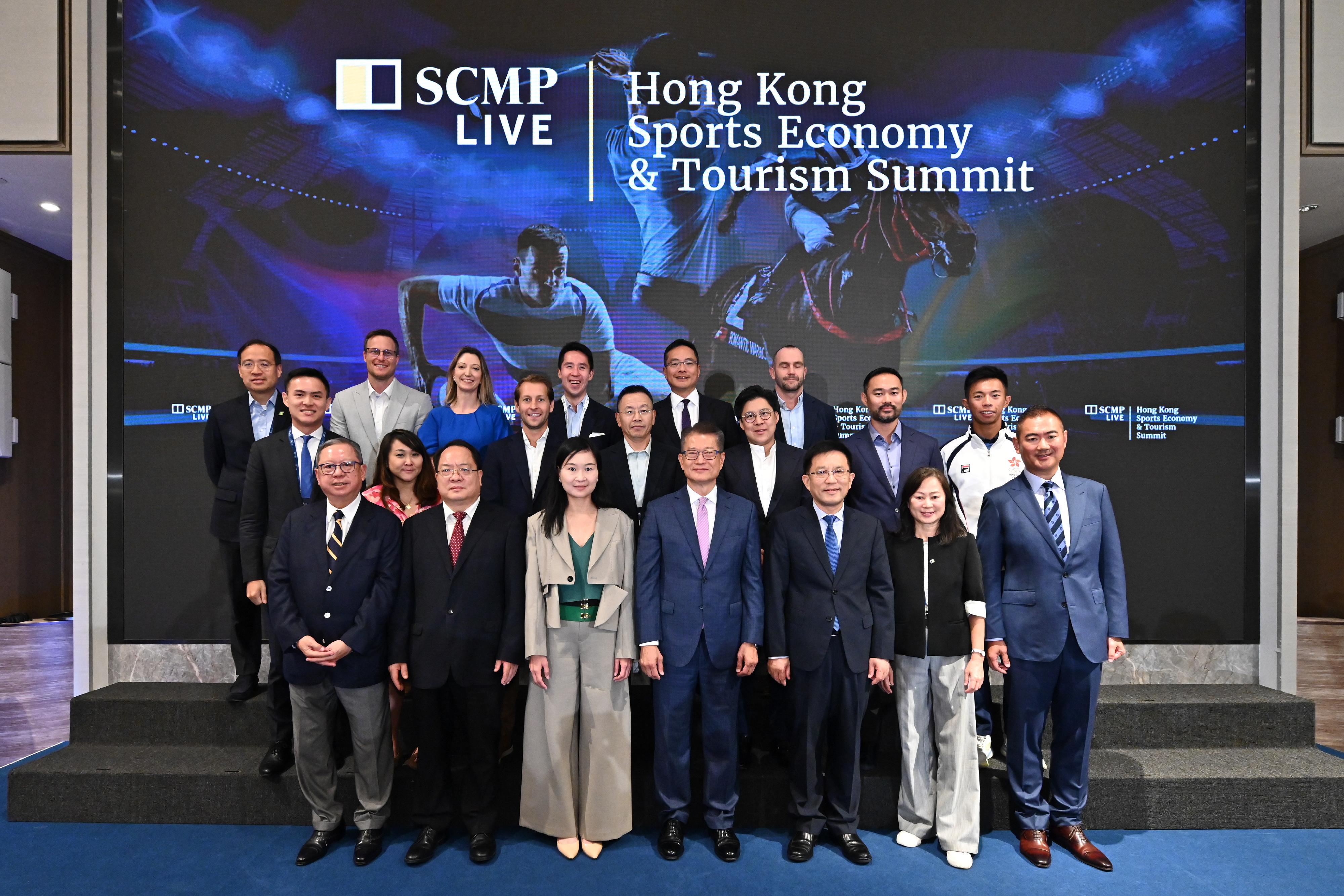 The Financial Secretary, Mr Paul Chan, attended the Hong Kong Sports Economy & Tourism Summit organised by the South China Morning Post today (September 6). Photo shows Mr Chan (first row, centre); the Secretary General of the Liaison Office of the Central People's Government in the Hong Kong Special Administrative Region (HKSAR), Mr Wang Songmiao (first row, third right); Deputy Commissioner of the Office of the Commissioner of the Ministry of Foreign Affairs of the People's Republic of China in the HKSAR Mr Pan Yundong (first row, second left); the Chief Executive Officer of the South China Morning Post (SCMP), Ms Catherine So (first row, third left); the Editor-in-Chief of the SCMP, Ms Tammy Tam (first row, second right); and the President of the Hong Kong Golf Club, Dr Peter Lam (first row, first left), with other guests at the summit.