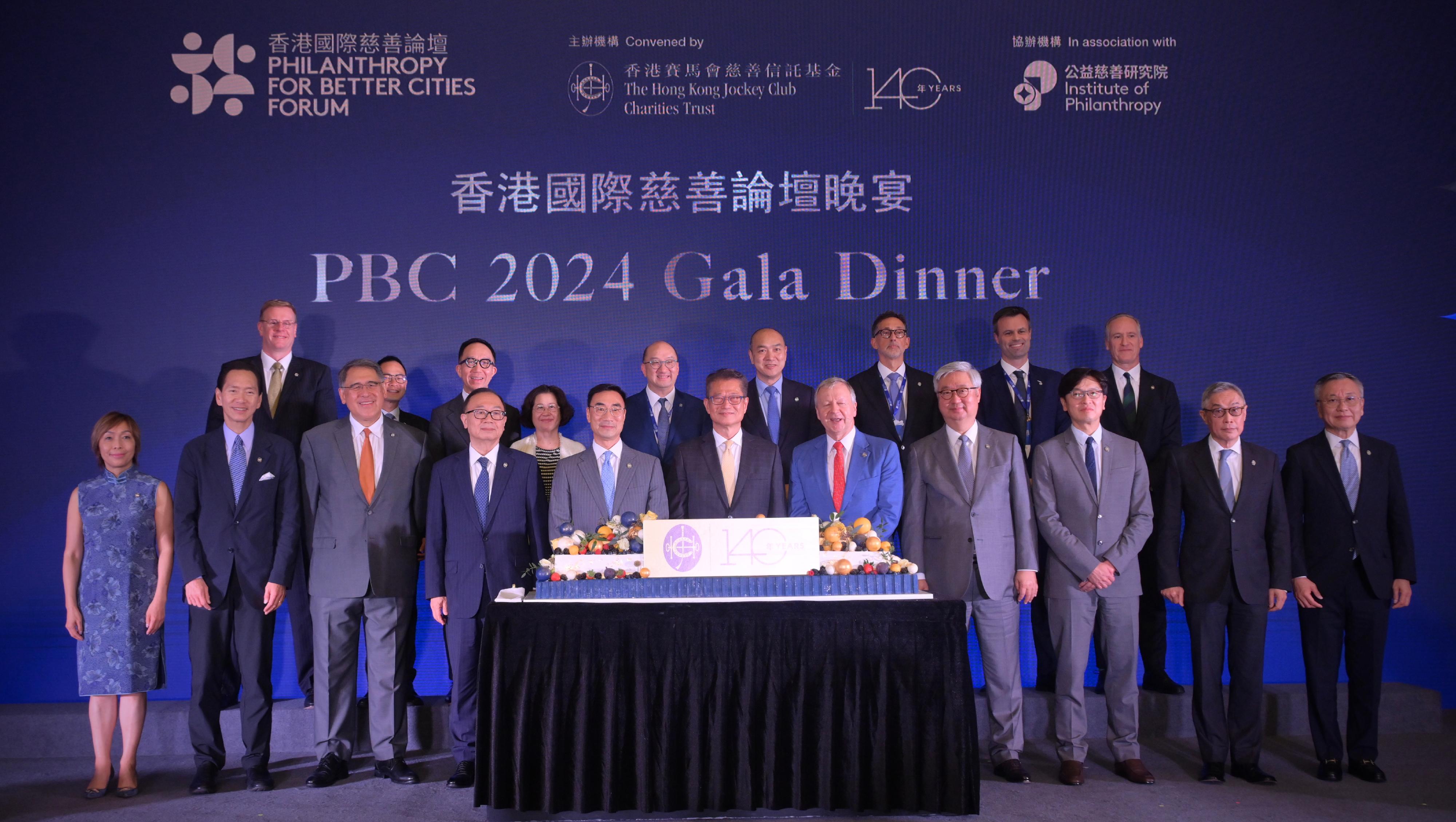 The Financial Secretary, Mr Paul Chan, attended the Gala Dinner of the Philanthropy for Better Cities Forum 2024 today (September 10). Photo shows Mr Chan (front row, centre); the Chairman of the Hong Kong Jockey Club, Mr Michael Lee (front row, fifth left); the Chief Executive Officer of the Hong Kong Jockey Club, Mr Winfried Engelbrecht-Bresges (front row, fifth right), and other guests at the Gala Dinner.