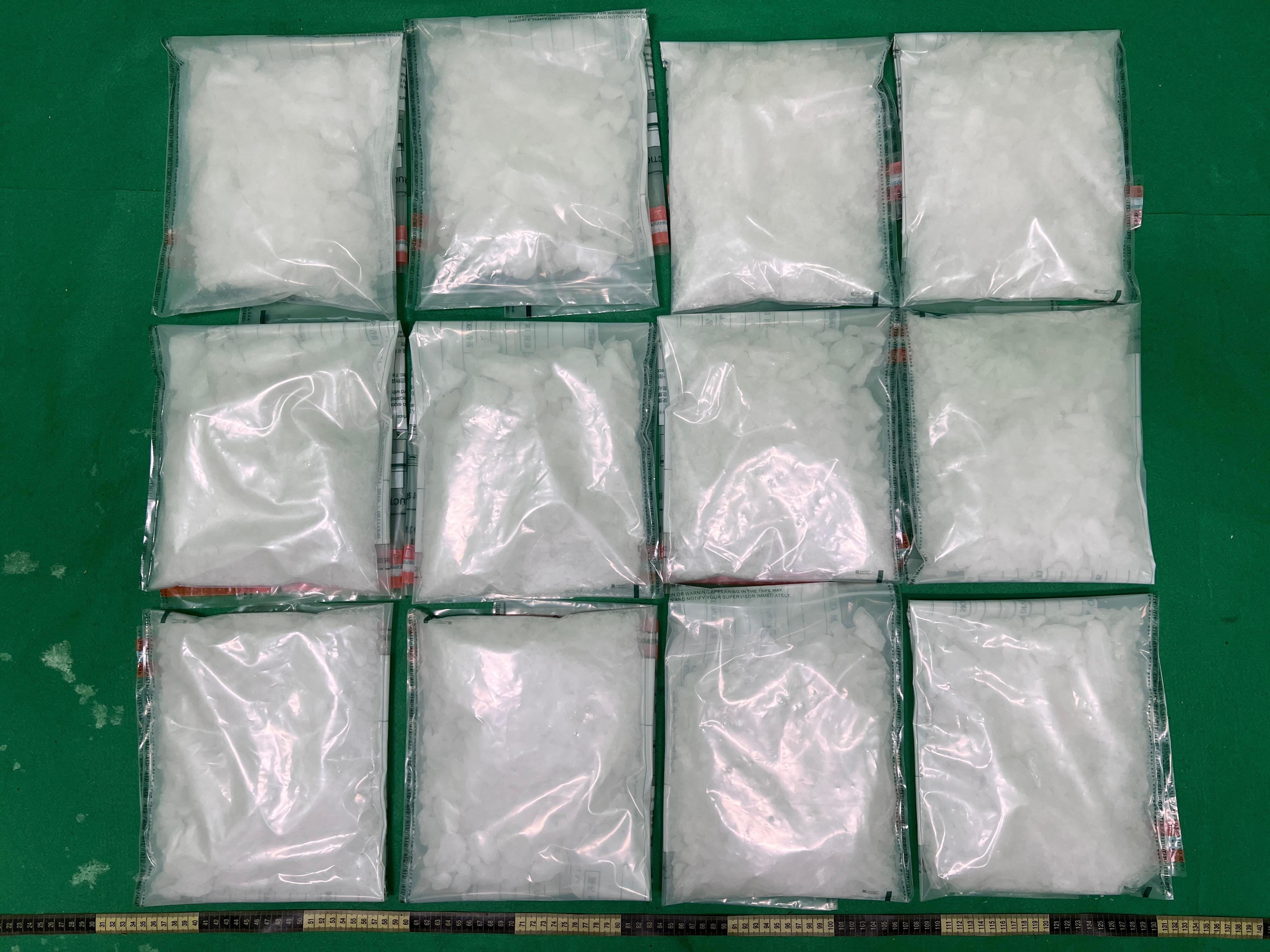 Hong Kong Customs yesterday (September 9) and today (September 10) detected two drug trafficking cases involving baggage concealment and seized about 10 kilograms of suspected methamphetamine, 10kg of suspected ketamine and 3.8kg of suspected MDMA, with a total estimated market value of about $10.3 million, at Hong Kong International Airport. Photo shows the suspected methamphetamine seized.