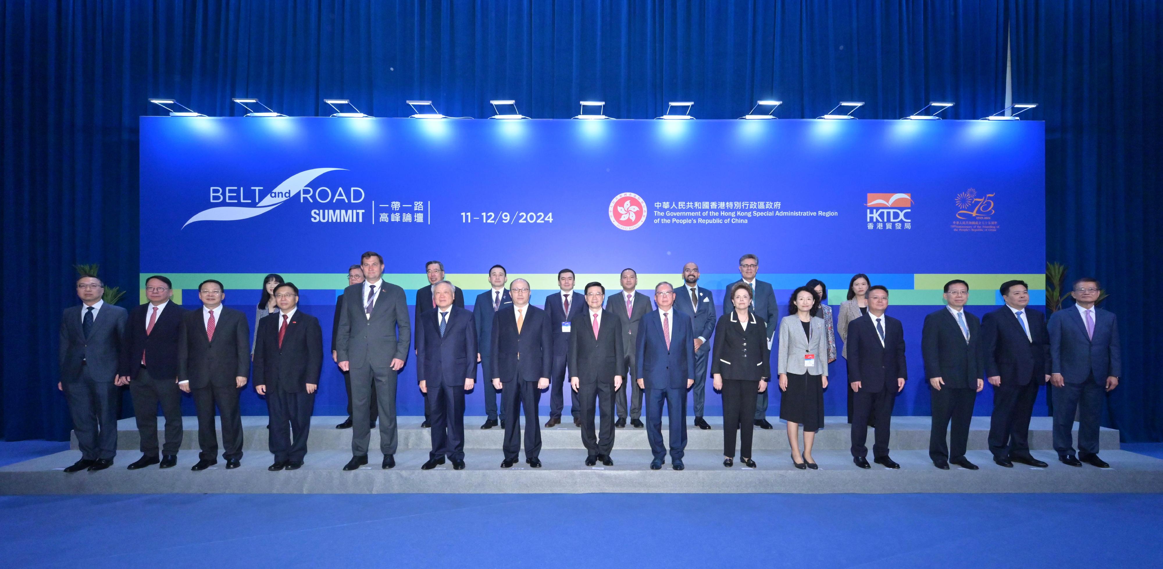 The Chief Executive, Mr John Lee, attended the Ninth Belt and Road Summit today (September 11). Photo shows Mr Lee (front row, centre); the Director of the Liaison Office of the Central People's Government in the Hong Kong Special Administrative Region (HKSAR), Mr Zheng Yanxiong (front row, seventh left); Deputy China International Trade Representative of the Ministry of Commerce Ms Li Yongjie (front row, fifth right); Vice Chairman of the State-owned Assets Supervision and Administration Commission Mr Gou Ping (front row, fourth right); Member of the Office Leadership of the Hong Kong and Macao Affairs Office of the State Council Mr Xiang Bin (front row, third right); the Commissioner of the Ministry of Foreign Affairs in the HKSAR, Mr Cui Jianchun (front row, fourth left); Deputy Secretary General of the National Development and Reform Commission Mr Xiao Weiming (front row, second right); the Chairman of the Hong Kong Trade Development Council, Dr Peter Lam (front row, seventh right); the Chief Secretary for Administration, Mr Chan Kwok-ki (front row, second left); the Financial Secretary, Mr Paul Chan (front row, first right); the Secretary for Justice, Mr Paul Lam, SC (front row, first left); and the Secretary for Commerce and Economic Development, Mr Algernon Yau (back row, second left), with other guests at the Summit.