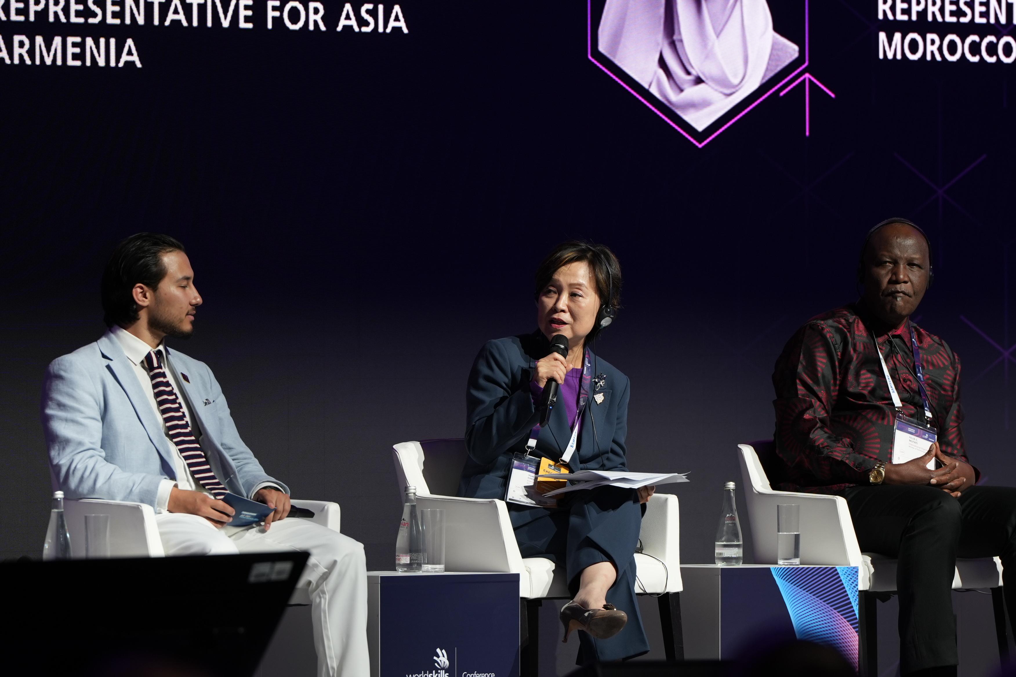 The Secretary for Education, Dr Choi Yuk-lin (centre), speaks at a panel discussion of the WorldSkills Conference in Lyon, France, on September 11 (France time) to promote vocational and professional education and training in Hong Kong.