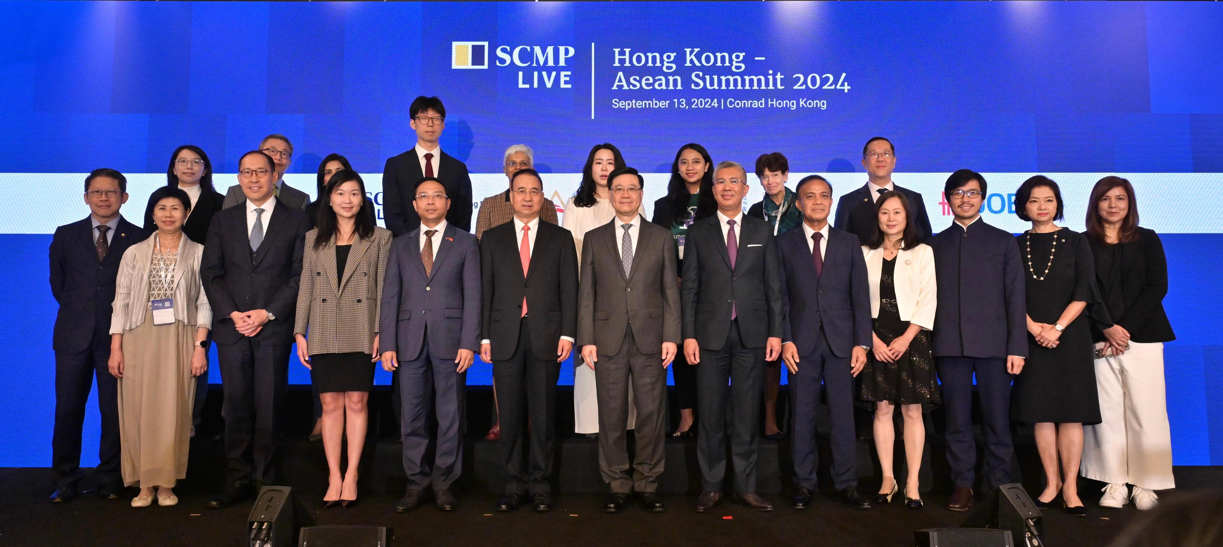 The Chief Executive, Mr John Lee, attended the Hong Kong - Asean Summit 2024 today (September 13). Photo shows (front row, from third left) the Chairman of the Hong Kong-ASEAN Foundation, Dr Daryl Ng; the Chief Executive Officer of the South China Morning Post, Ms Catherine So; the Secretary of State of the Ministry of Tourism of the Kingdom of Cambodia, Mr Prak Phannara; Deputy Director of the Liaison Office of the Central People's Government in the Hong Kong Special Administrative Region Mr Liu Guangyuan; Mr Lee; the Minister of Investment, Trade and Industry of Malaysia, Mr Tengku Zafrul Aziz; the Deputy Minister of Finance of the Lao People's Democratic Republic, Mr Phouthanouphet Saysombath, and other guests at the summit.