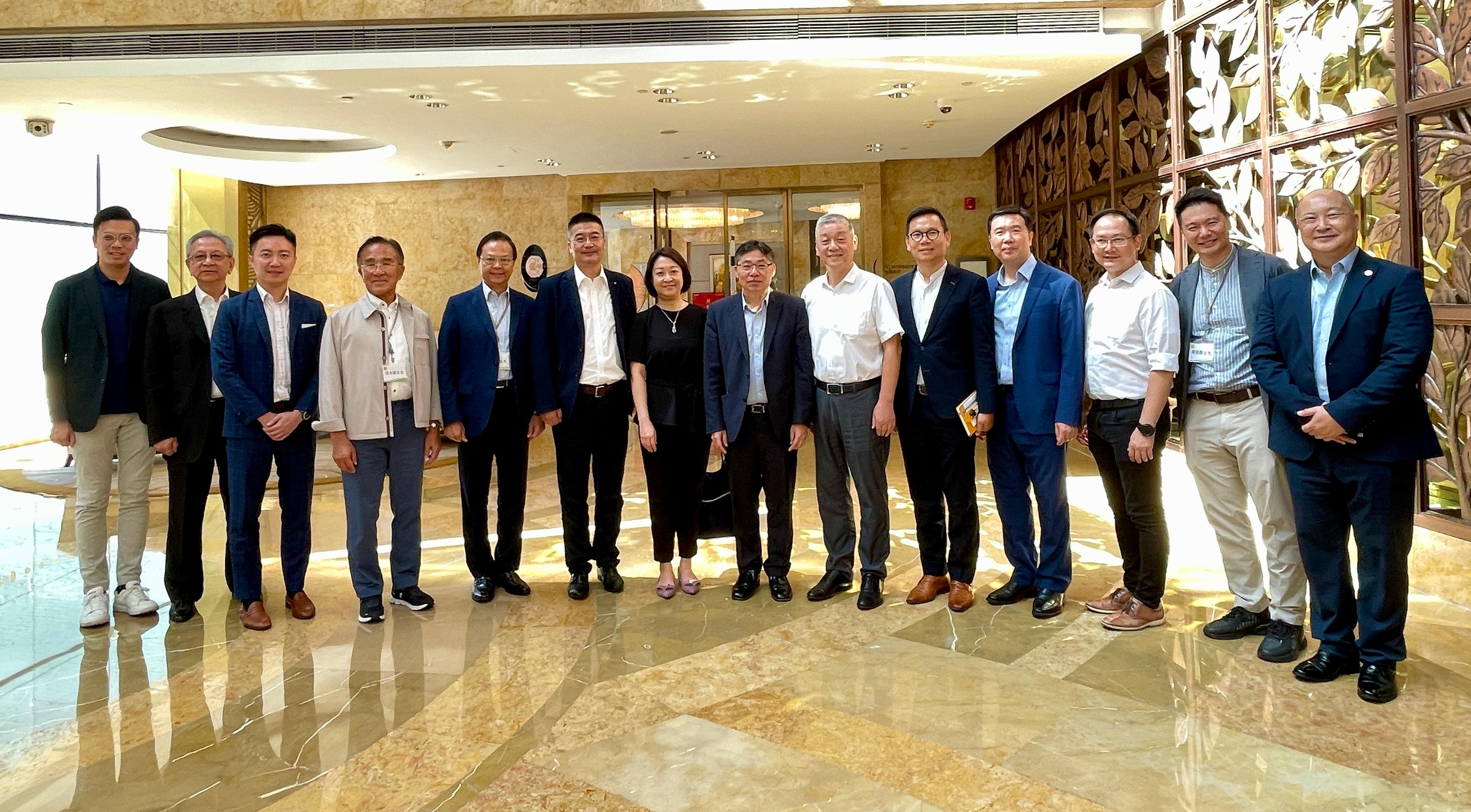 The Secretary for Transport and Logistics, Mr Lam Sai-hung, together with Members of the Legislative Council (LegCo) Panel on Transport, visited Hangzhou today (September 13). Photo shows Mr Lam (seventh right); the Chairman of the LegCo Panel on Transport, Dr Chan Han-pan (fifth right); the Commissioner for Transport, Ms Angela Lee (seventh left); and Panel Members with Deputy Director General of the Hangzhou Transportation Bureau Mr Wu Zhirong (sixth right) after their meeting.