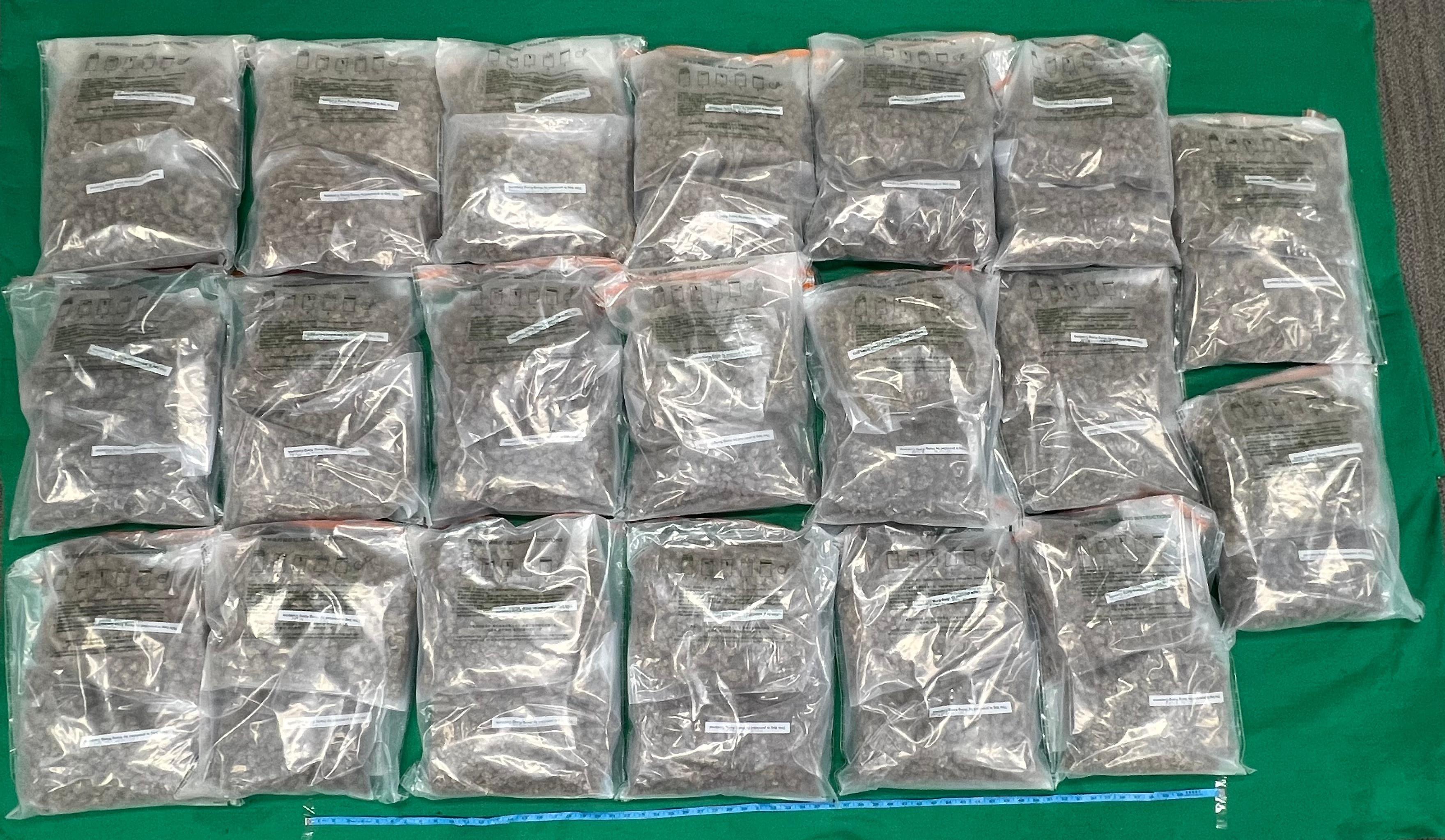 Hong Kong Customs detected two dangerous drugs cases in Yau Tong and Hong Kong International Airport yesterday (September 12) and seized a total of about 27 kilograms of suspected cannabis buds with an estimated market value of about $7.7 million. Photo shows the suspected cannabis buds seized in the first case.