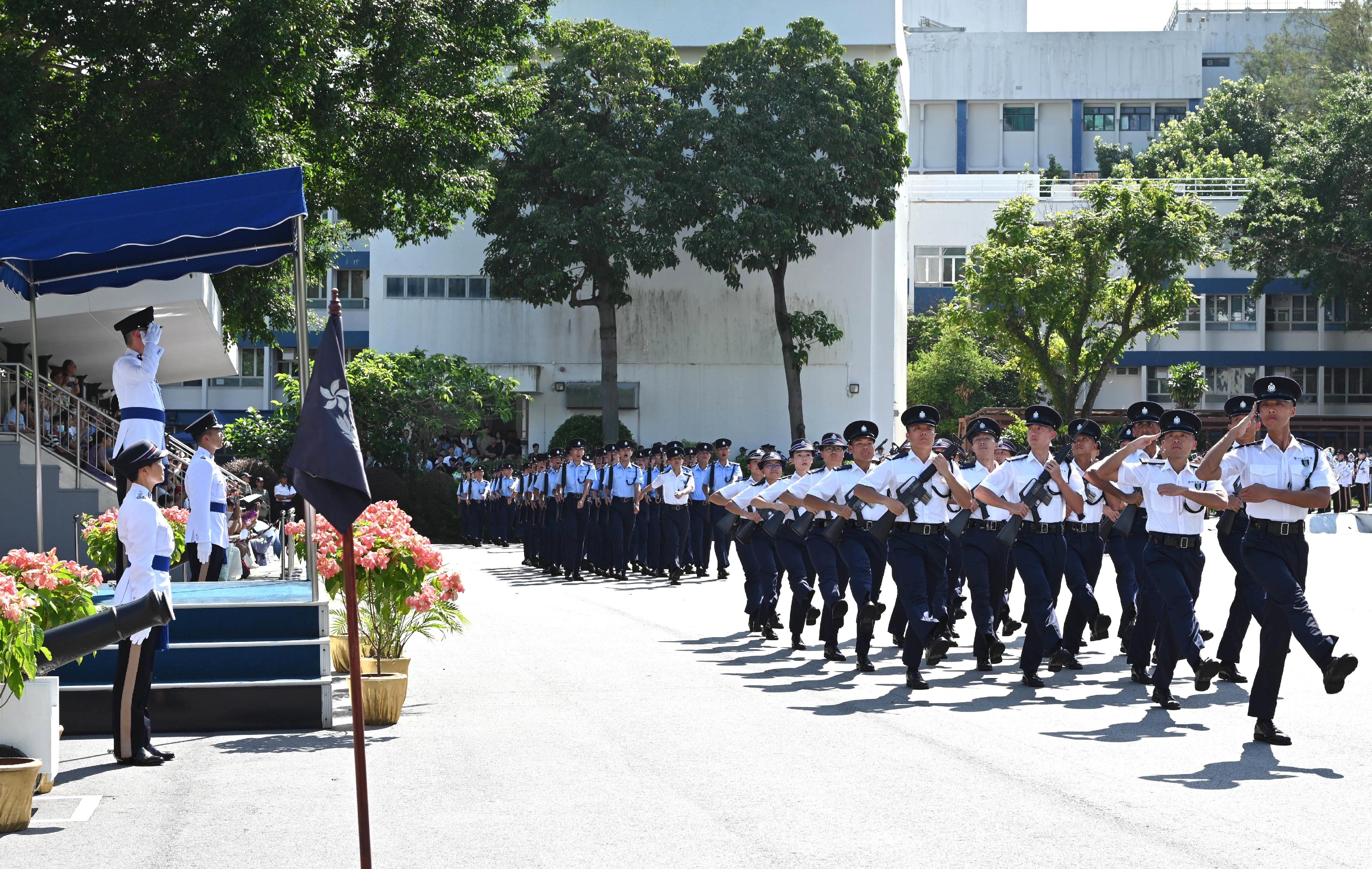 The Deputy Commissioner of Police (National Security), Mr Kan Kai-yan, today (September 14) inspects a passing-out parade of 29 probationary inspectors and 164 recruit police constables at the Hong Kong Police College.