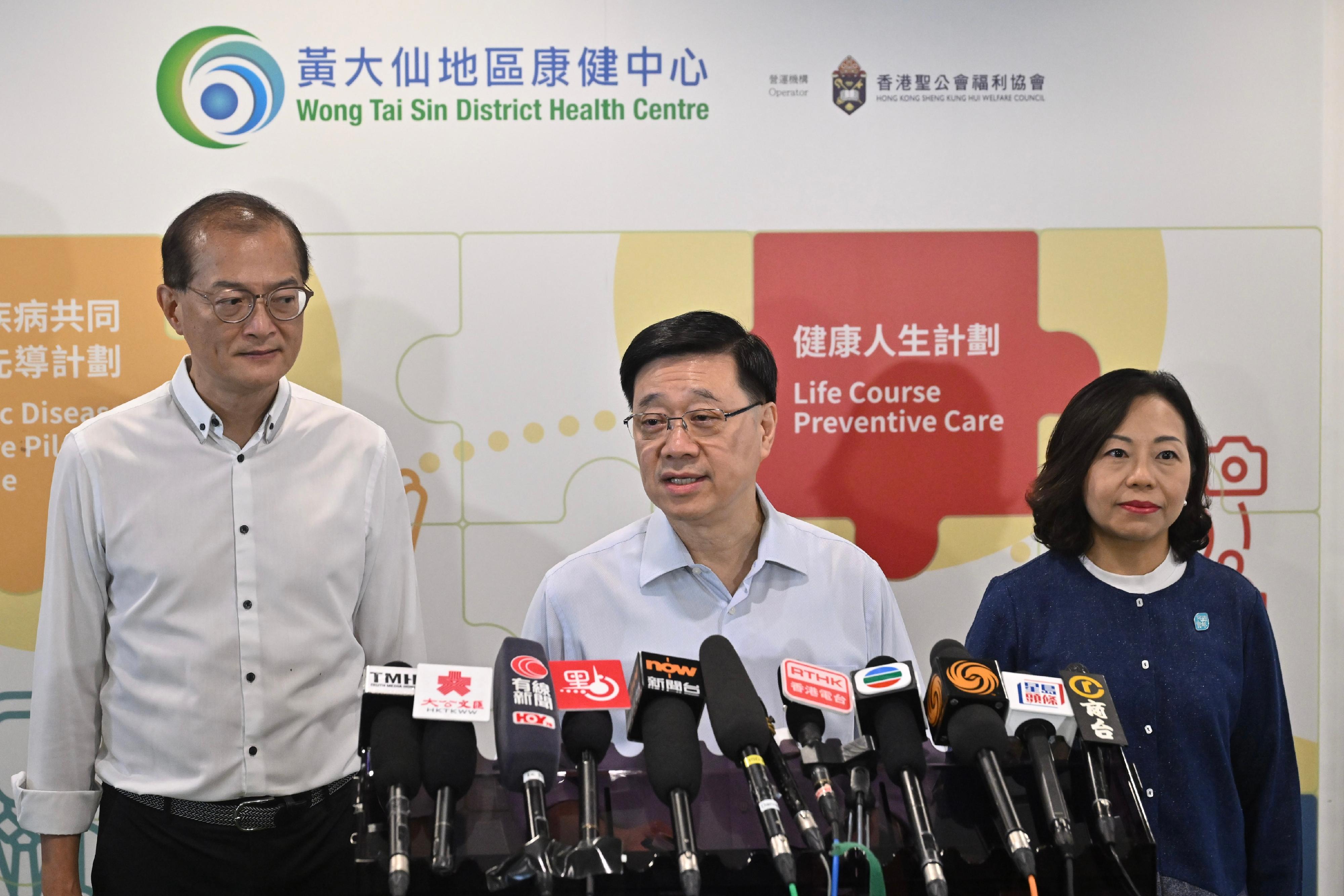 The Chief Executive, Mr John Lee (centre), accompanied by the Secretary for Health, Professor Lo Chung-mau (left); and the Secretary for Home and Youth Affairs, Miss Alice Mak (right), met the media after visiting Wong Tai Sin District today (September 14) to gather public views on the upcoming Policy Address.