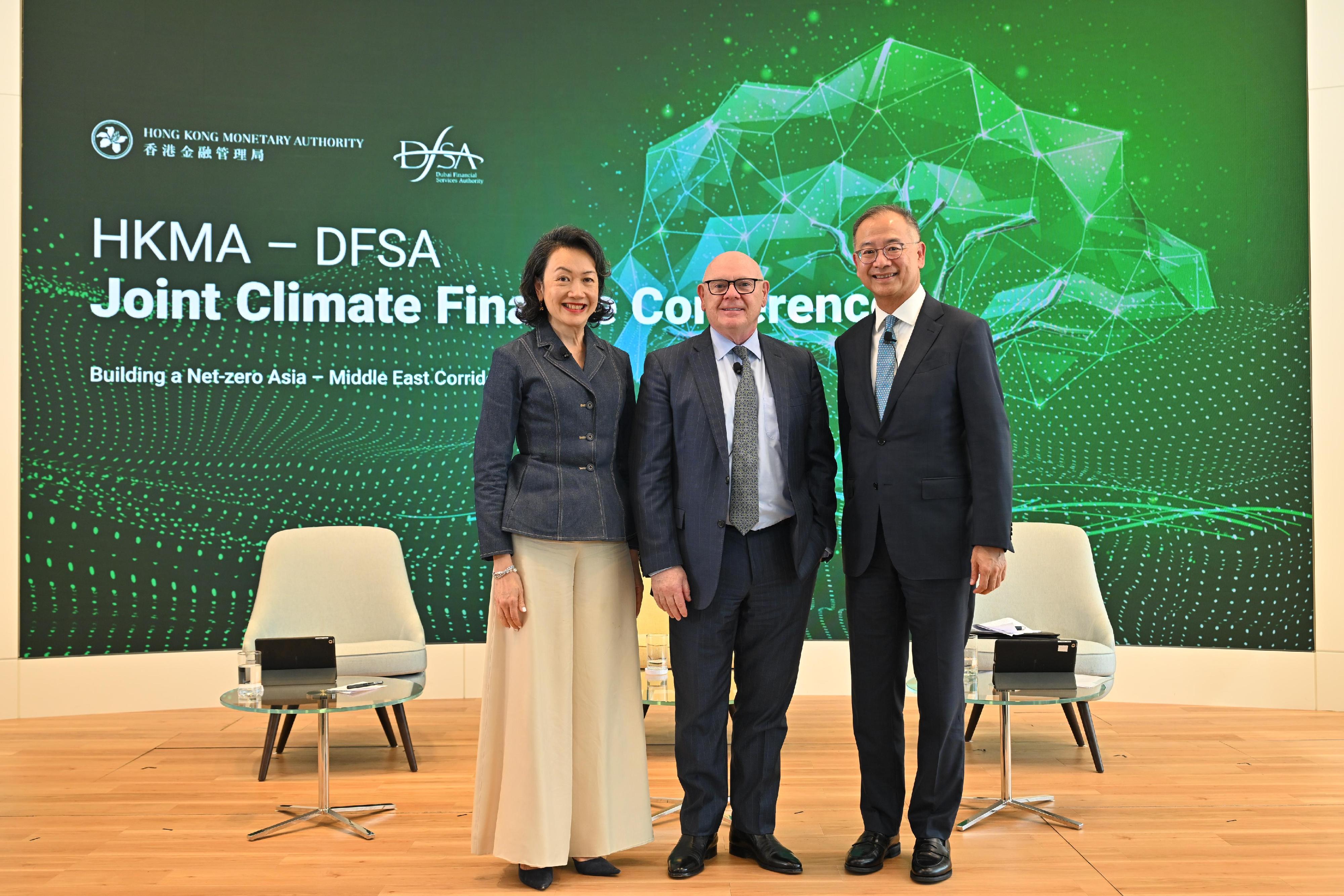 (From left) Senior Partner, Hong Kong, Freshfields Bruckhaus Deringer and Co Vice Chair, IFRS Foundation, Ms Teresa Ko; the Chief Executive of the Dubai Financial Services Authority, Mr Ian Johnston; and the Chief Executive of the Hong Kong Monetary Authority, Mr Eddie Yue, share their visions for net-zero transition. 