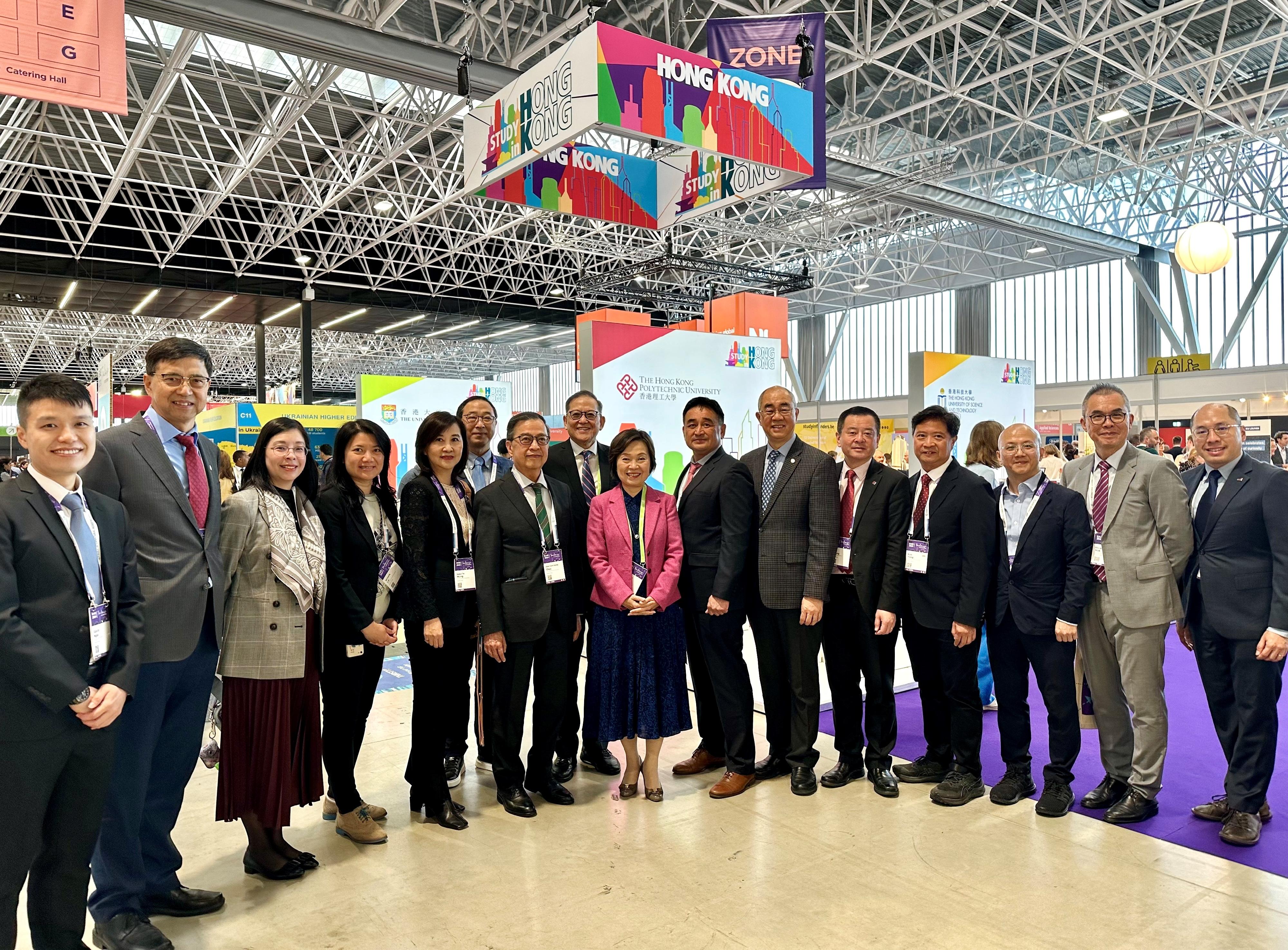 The Secretary for Education, Dr Choi Yuk-lin, visited the Hong Kong Pavilion set up by the Heads of Universities Committee Standing Committee on Internationalisation and funded by the University Grants Committee (UGC) at the European Association for International Education Conference and Exhibition in Toulouse, France, on September 18 (France time). Photo shows Dr Choi (eighth right) and the Secretary-General of the UGC, Professor James Tang (eighth left), with participating university representatives.