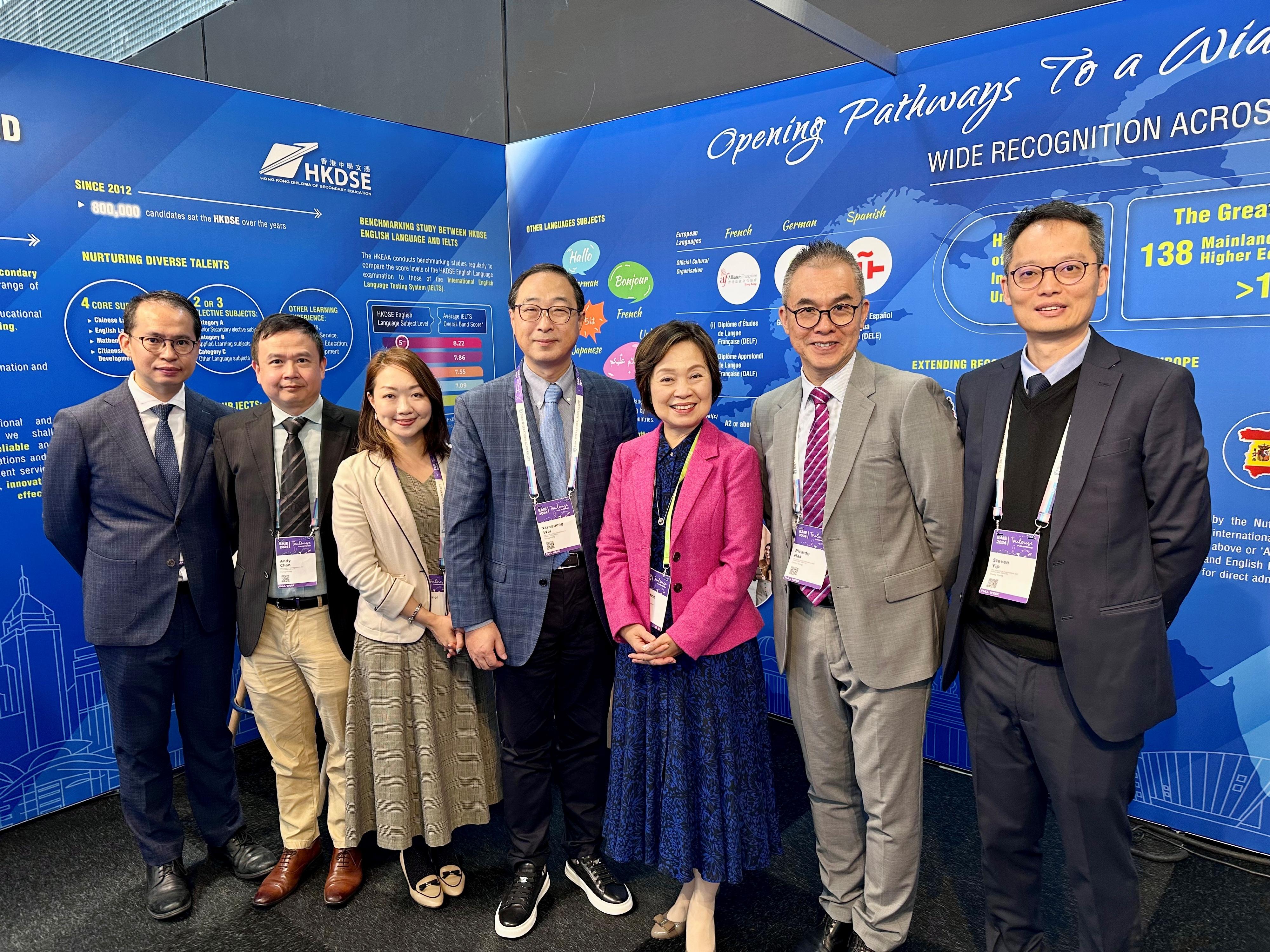 The Secretary for Education, Dr Choi Yuk-lin, visited the booth of the Hong Kong Examinations and Assessment Authority (HKEAA) for promotion of the Hong Kong Diploma of Secondary Education Examination at the European Association for International Education Conference and Exhibition in Toulouse, France, on September 18 (France time). Photo shows Dr Choi (third right) with the Secretary General of the HKEAA, Professor Wei Xiangdong (centre), and the Director of Public Examinations of the HKEAA, Professor Ricardo Mak (second right).