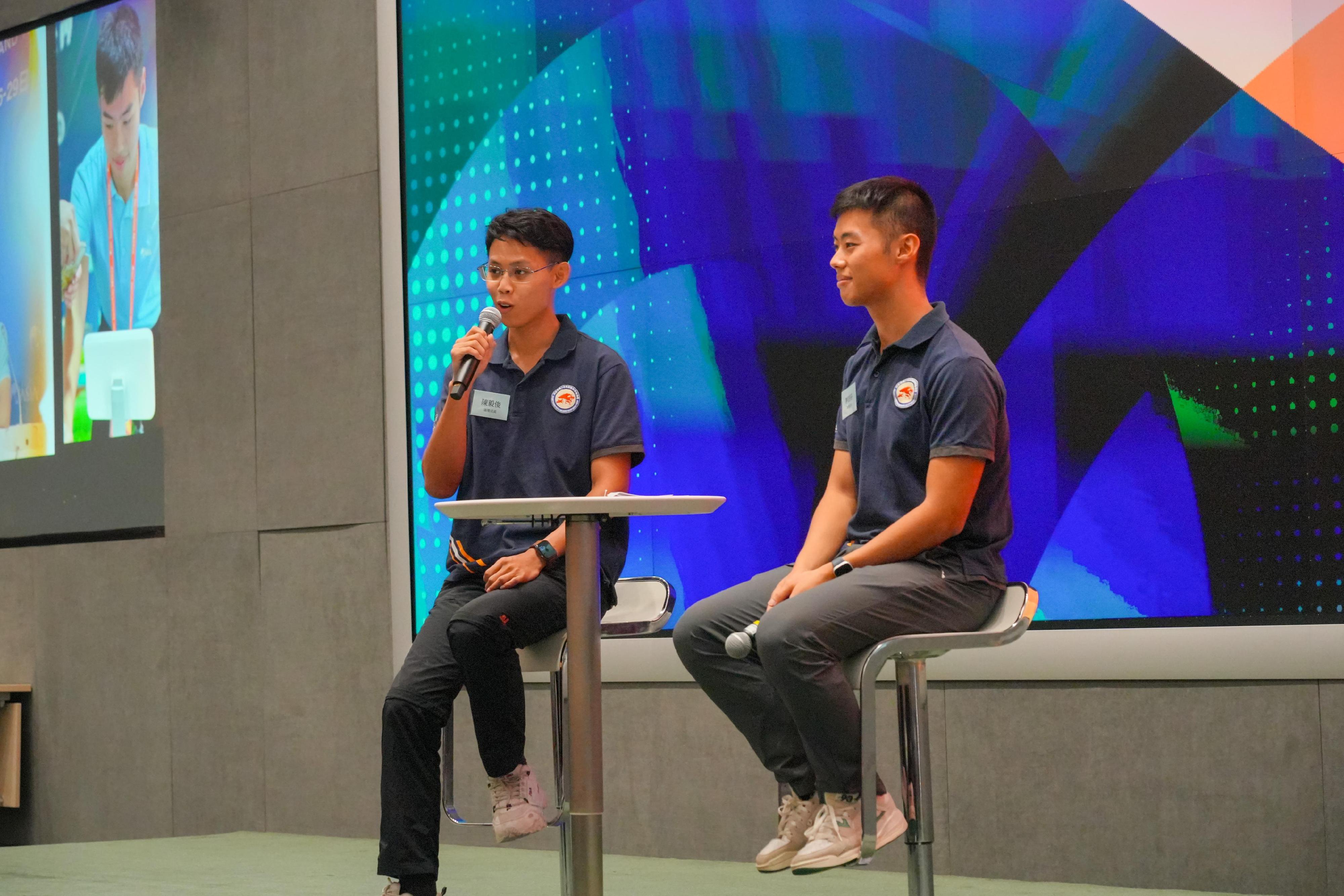 The annual review of the Security Bureau Youth Uniformed Group Leaders Forum was held at the Central Government Offices today (September 21) for youth members to give presentations on their research topics and reflect on their learning experiences over the past year. Photo shows outstanding alumni sharing experiences of participation in the Boao Forum for Asia Annual Conference 2024 as Hong Kong youth volunteers.