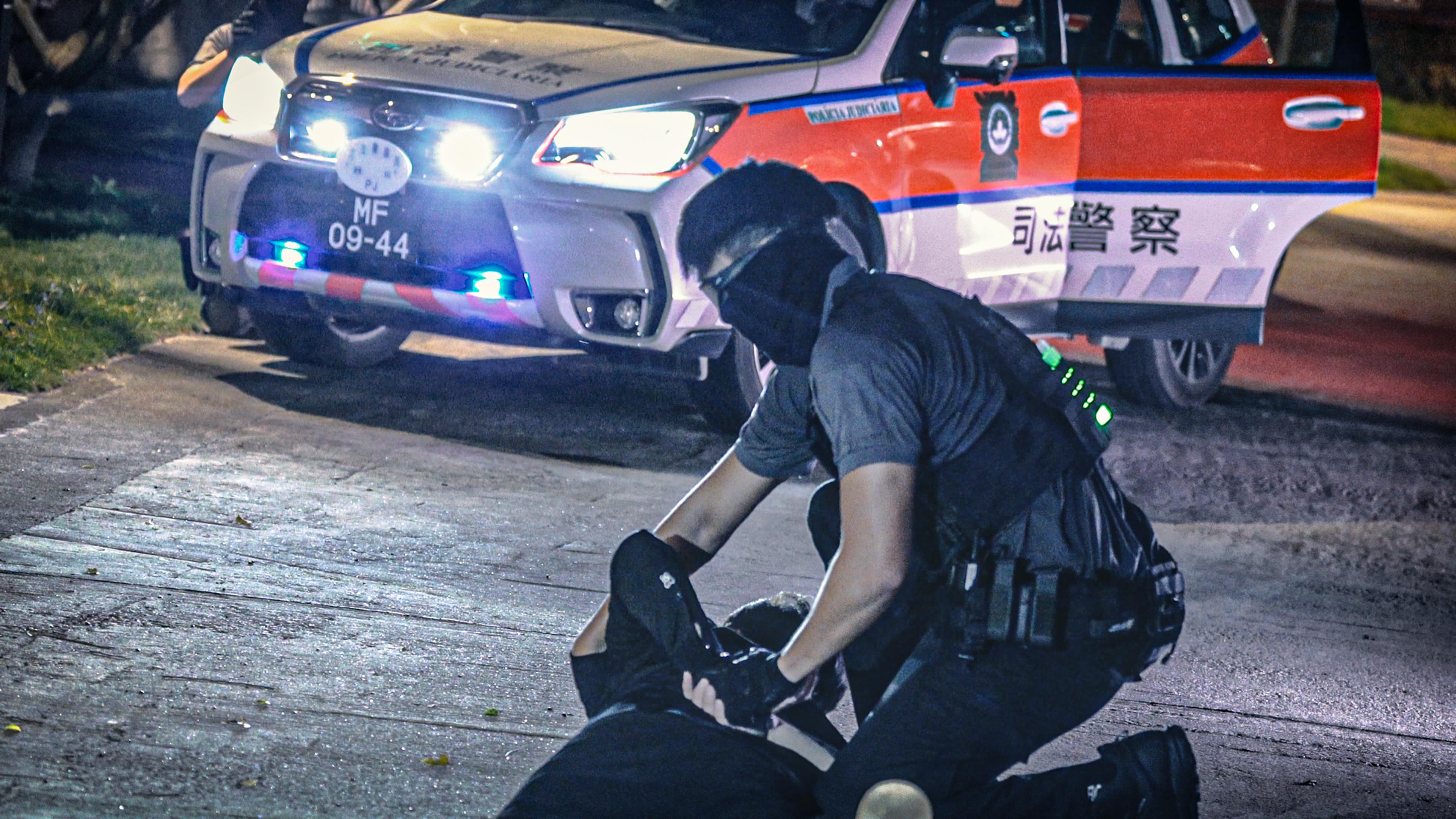 The Cyber Security and Technology Crime Bureau of the Hong Kong Police Force held the Counter Cyber and Physical Terrorism Joint Exercise 2024 codenamed BATTLEAIR in collaboration with the INTERPOL and the Macao Judiciary Police today (September 21). Photo shows an officer of the Macao Judiciary Police subduing a terrorist in Macao.
