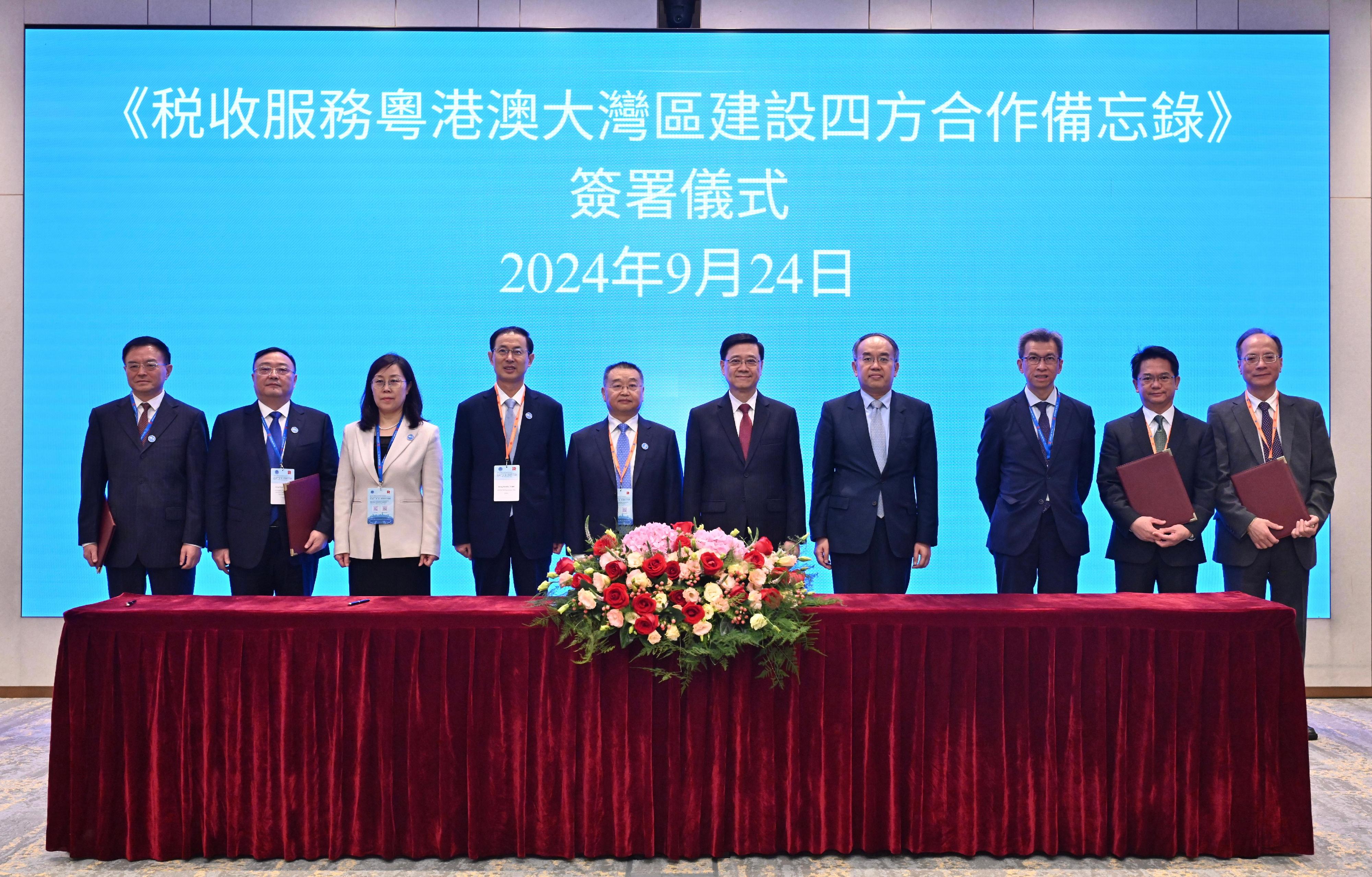 The Chief Executive, Mr John Lee, and the Commissioner of the State Taxation Administration, Mr Hu Jinglin, today (September 24) witnessed the signing of a memorandum of understanding on tax co-operation within the Guangdong-Hong Kong-Macao Greater Bay Area among the finance and taxation departments of Guangdong Province, Shenzhen, the Hong Kong Special Administrative Region and the Macao Special Administrative Region (SAR) on the margins of the 5th Belt and Road Initiative Tax Administration Cooperation Forum.  Photo shows (from left) the Director General of Shenzhen Tax Service of the State Taxation Administration, Mr Guo Xiaolin; the Director General of Guangdong Provincial Tax Service of the State Taxation Administration, Mr Jiang Wufeng; the Director General of the International Taxation Department of the State Taxation Administration, Ms Meng Yuying; the Deputy Commissioner of the State Taxation Administration and the Executive Secretary of the Belt and Road Initiative Tax Administration Cooperation Mechanism Secretariat, Mr Wang Daoshu; Mr Hu; Mr Lee; the Secretary for Financial Services and the Treasury, Mr Christopher Hui; the Permanent Secretary for Financial Services and the Treasury (Treasury), Mr Andrew Lai; the Commissioner of Inland Revenue, Mr Tam Tai-pang; and the Director of Financial Services Bureau of the Macao SAR, Mr Iong Kong-leong, at the signing ceremony.