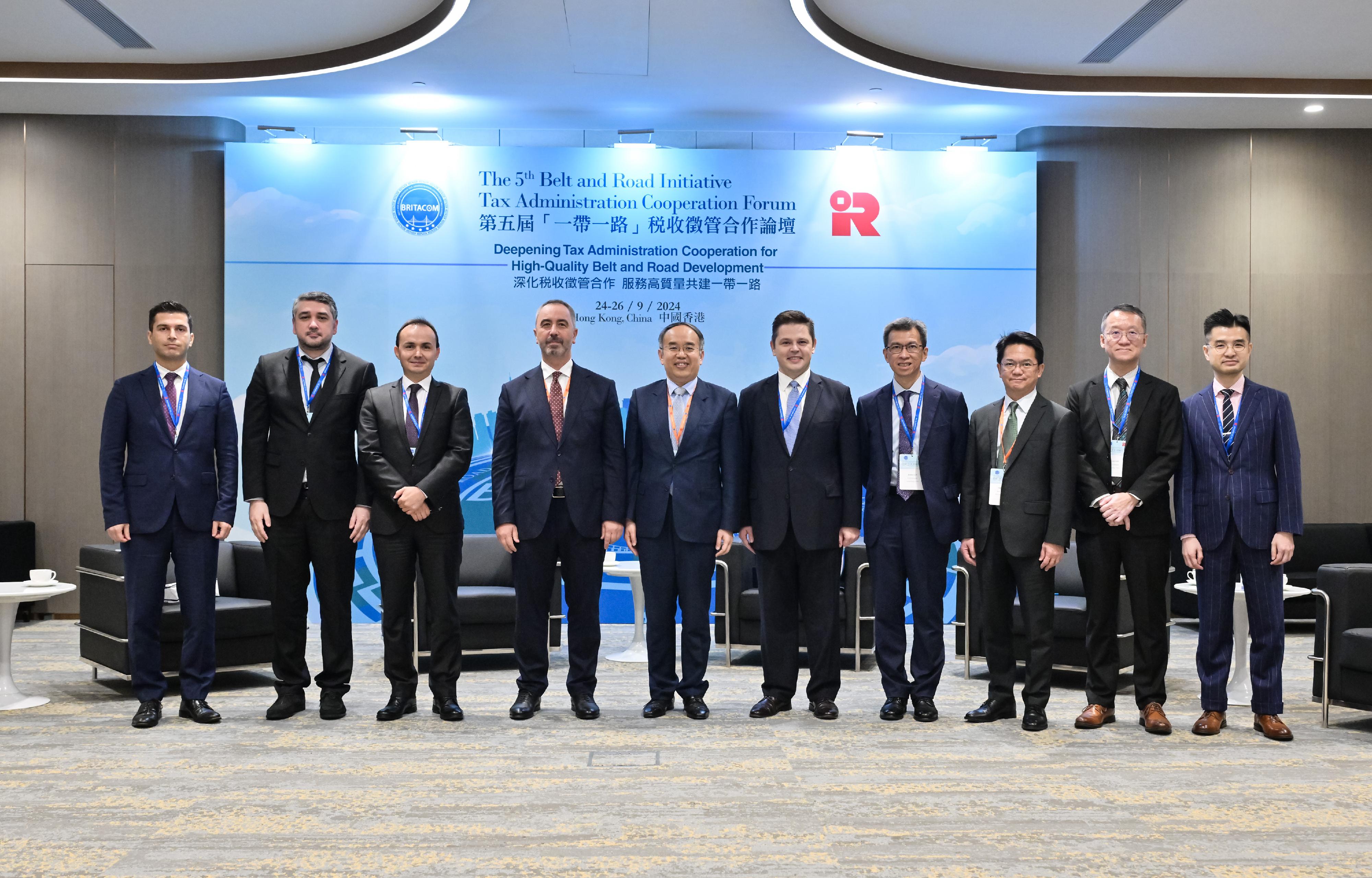 The Secretary for Financial Services and the Treasury, Mr Christopher Hui, today (September 24) held bilateral meetings with tax officials from other countries on the sidelines of the 5th Belt and Road Initiative Tax Administration Cooperation Forum to discuss deepening tax co-operation at the international and Belt and Road levels. Photo shows Mr Hui (fifth left); the Commissioner of the Turkish Revenue Administration, Mr Bekir Bayrakdar (fourth left), with representatives of both sides at the bilateral meeting.