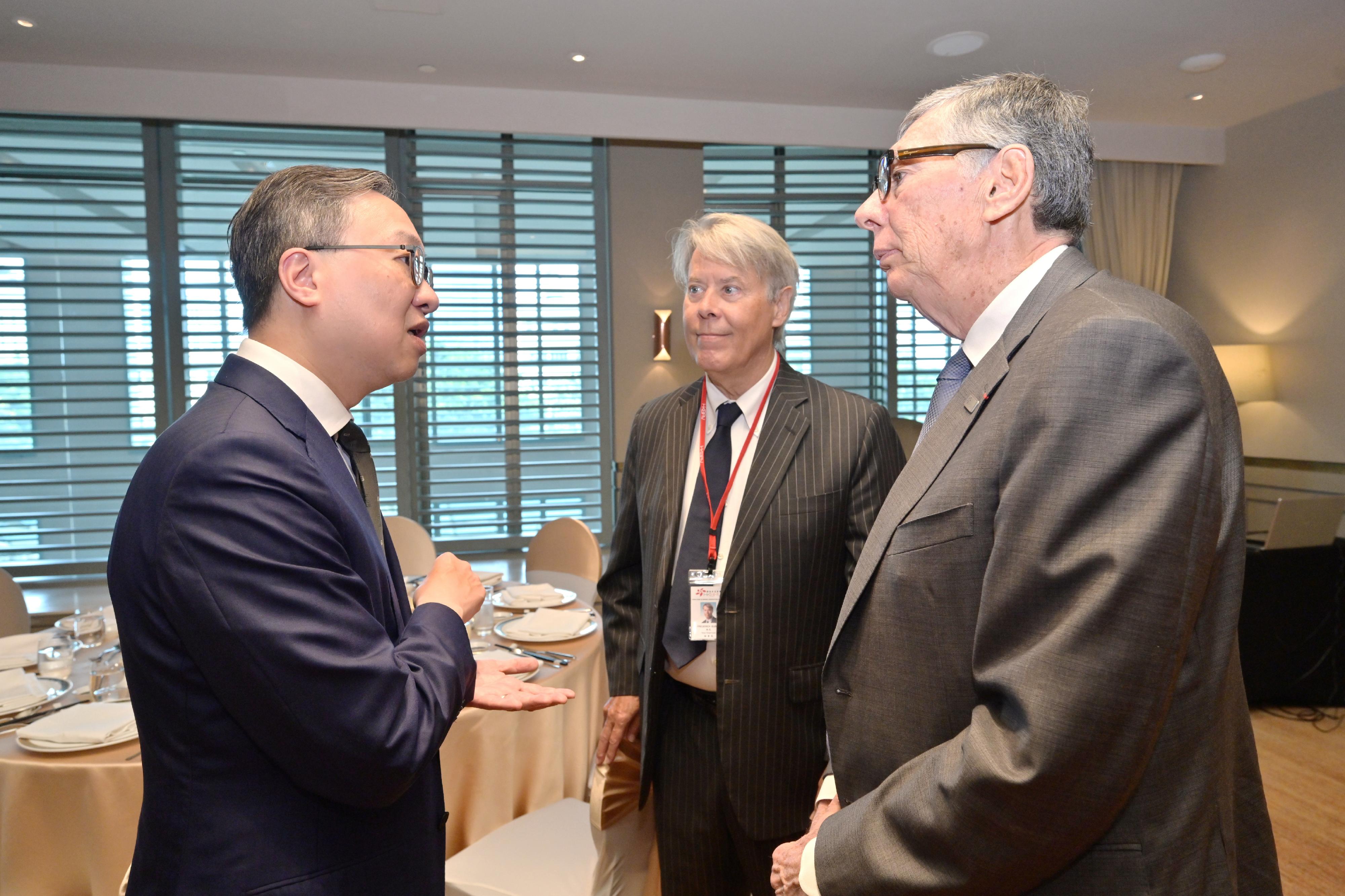 The Secretary for Justice, Mr Paul Lam, SC, today (September 25) continued his visit programme in the Association of Southeast Asian Nations in Ho Chi Minh City, Vietnam, with a delegation comprising representatives from the Law Society of Hong Kong, the Hong Kong Bar Association and alternative dispute resolution organisations. Photo shows Mr Lam (left) and Vice-Chairman of the Hong Kong Business Association Vietnam Mr Fred Burke (centre) at a lunch meeting.