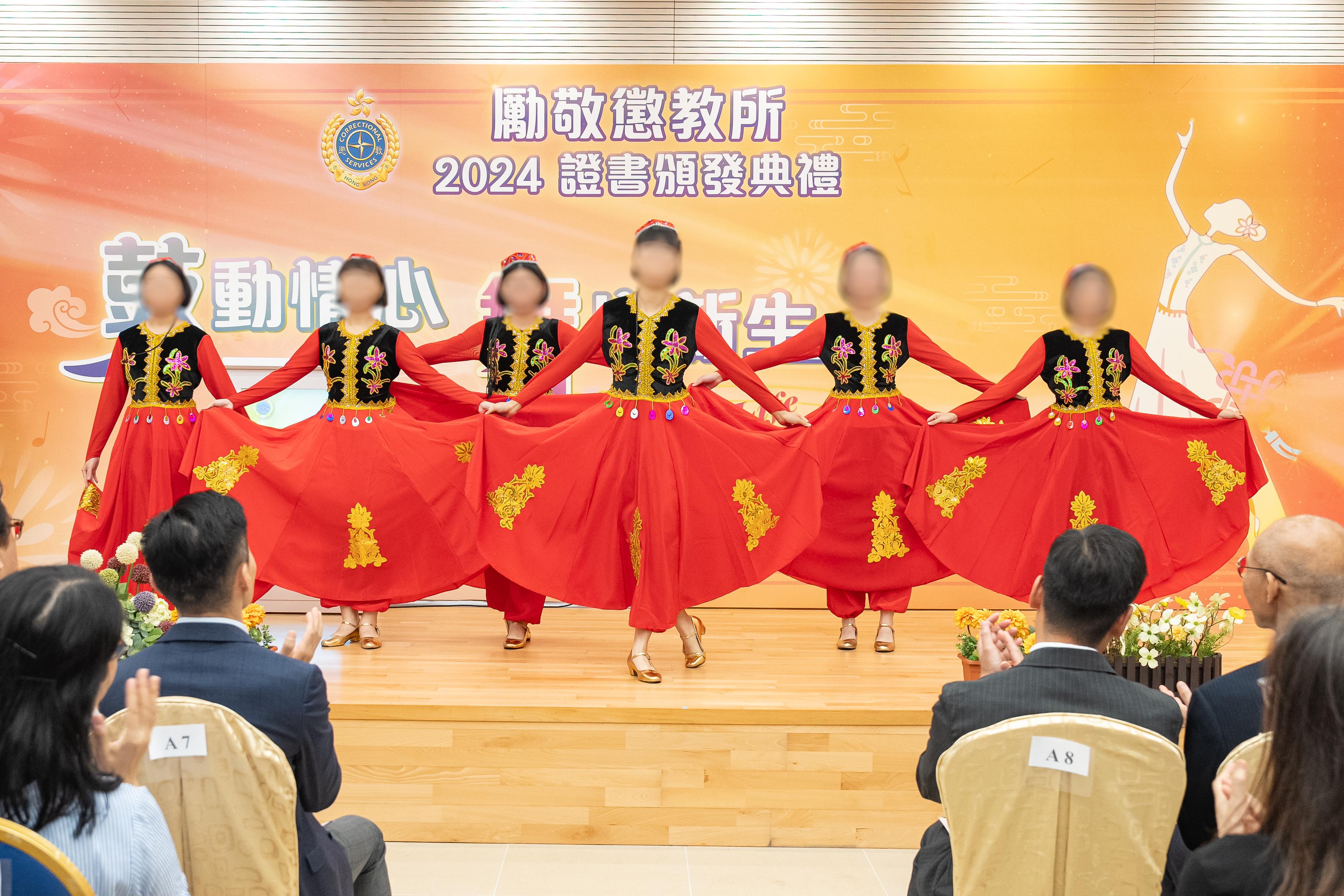 Young persons in custody at Lai King Correctional Institution of the Correctional Services Department were presented with certificates at a ceremony today (September 25) in recognition of their efforts and achievements in studies and vocational examinations. Photo shows young persons in custody staging a traditional Chinese dance performance.