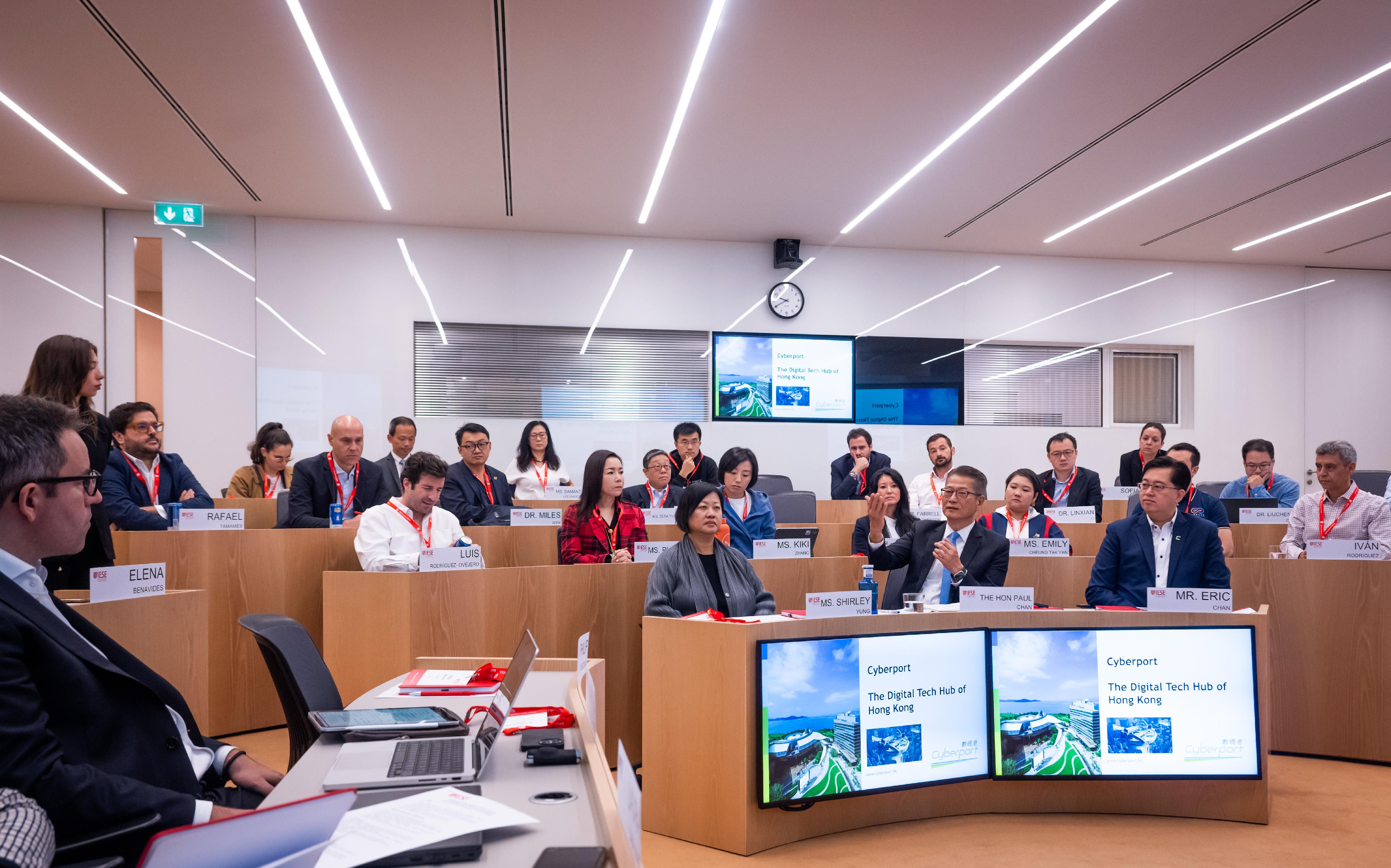 The Financial Secretary, Mr Paul Chan, led a delegation of tech start-ups to visit the IESE Business School in Spain in the morning today (Madrid time, September 25). Photo shows Mr Chan (front row, centre) attending an exchange session organised by the school, where he introduced Hong Kong's innovation and technology developments.