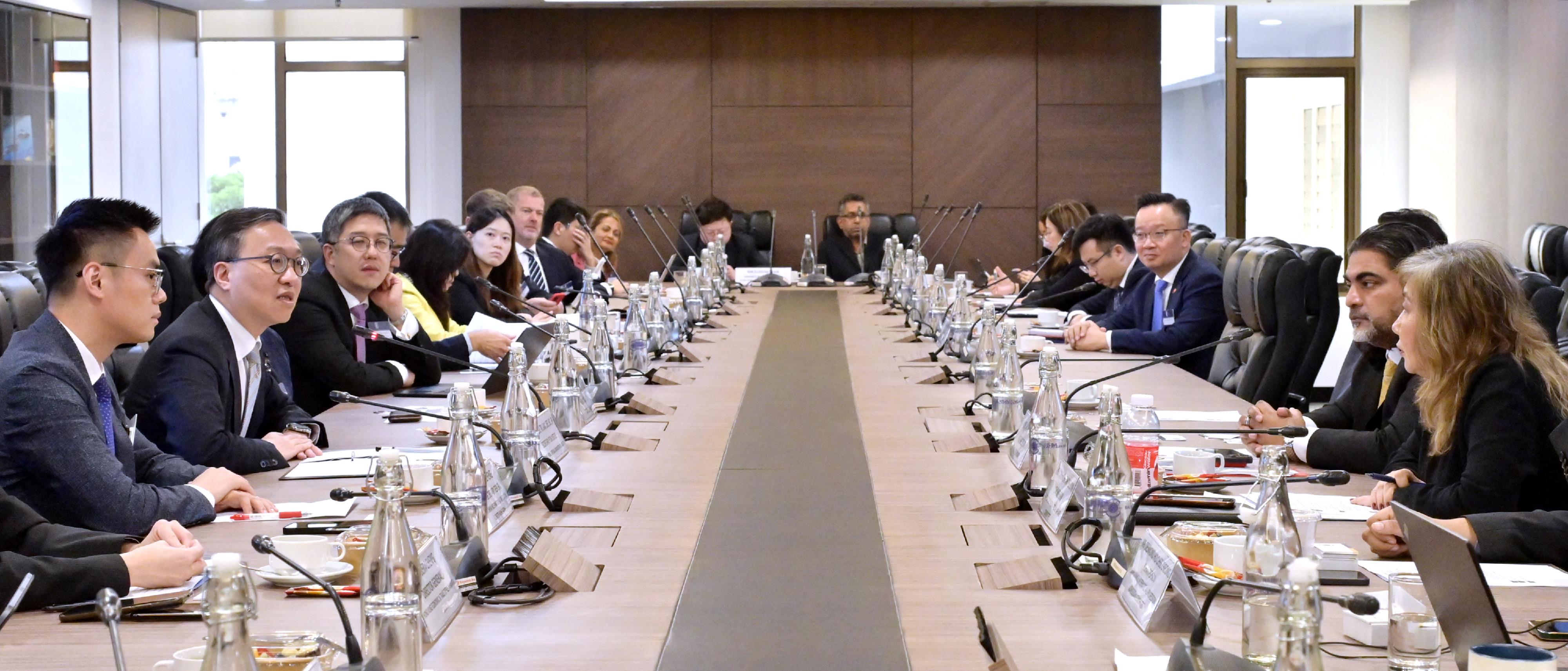 The Secretary for Justice, Mr Paul Lam, SC, leading a delegation comprising representatives from the Law Society of Hong Kong, the Hong Kong Bar Association and alternative dispute resolution organisations, continued his visit to Kuala Lumpur, Malaysia today (September 27). Photo shows Mr Lam (second left) and the delegation meeting with the Vice-President of the Malaysian Bar, Mr Anand Raj (second right).

