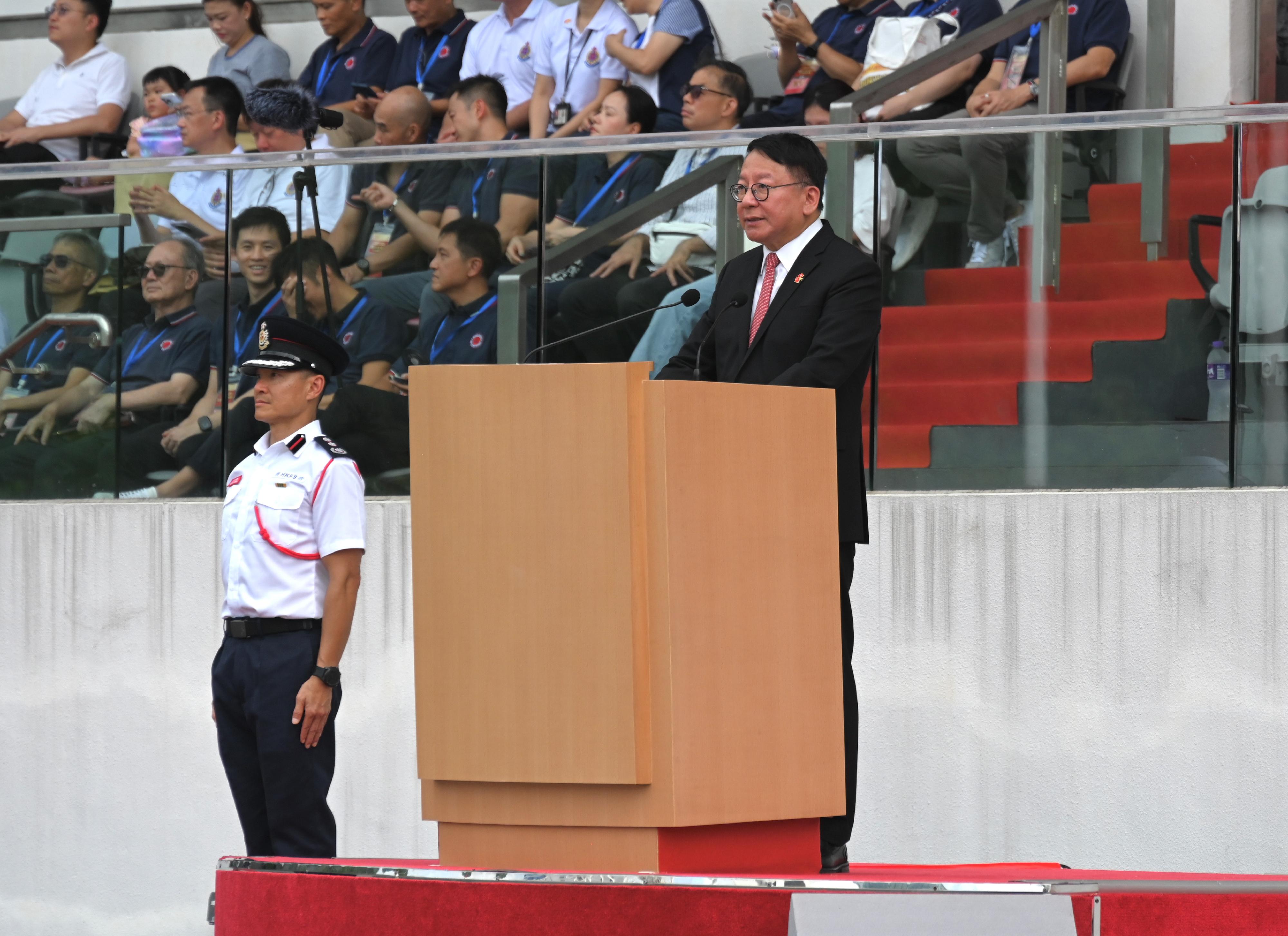 The Chief Secretary for Administration, Mr Chan Kwok-ki, speaks at the Grand Parade by Disciplined Services and Youth Groups cum Fun Day for Celebrating the 75th Anniversary of the Founding of the People's Republic of China today (October 1). 