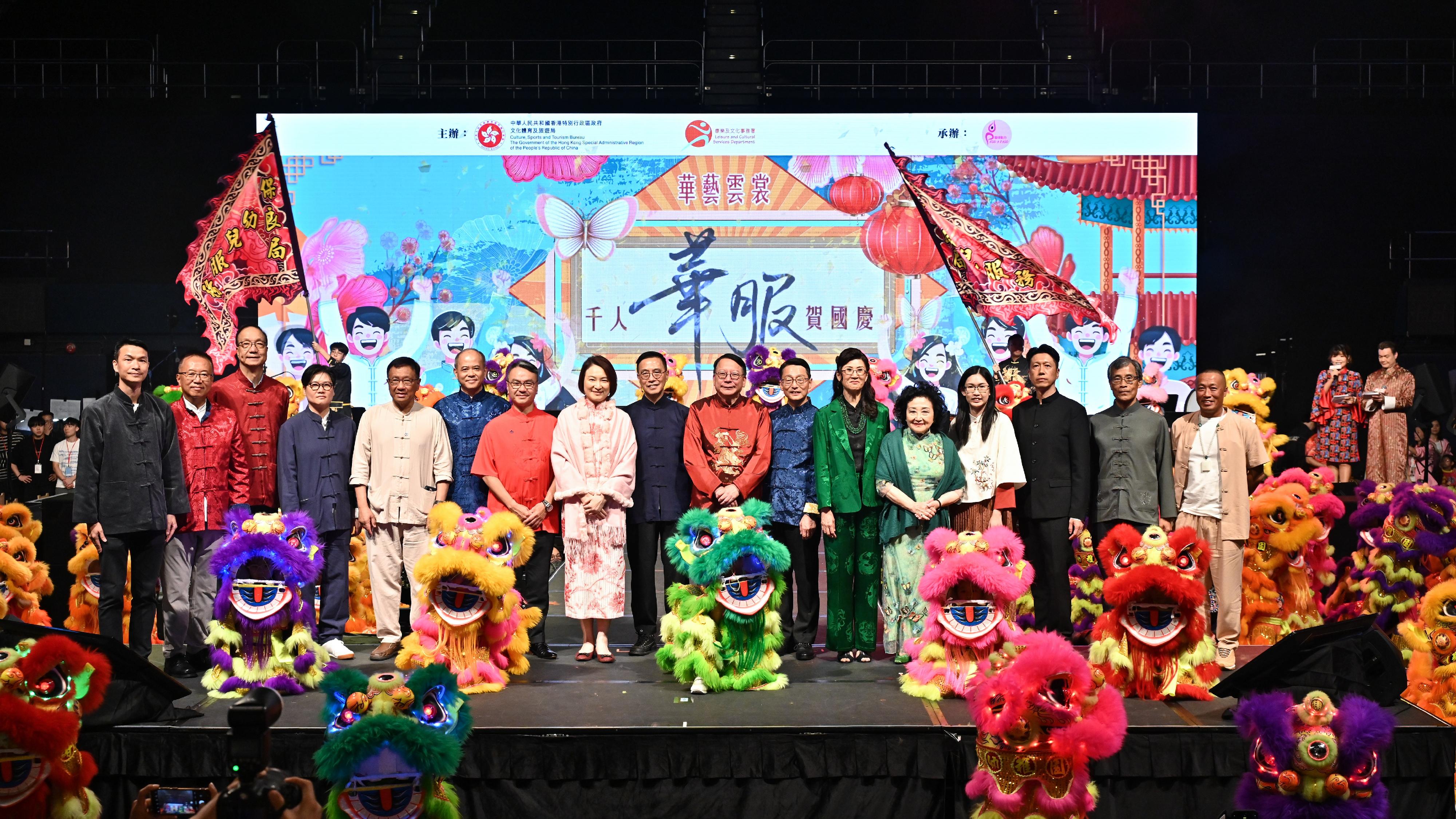 The Chief Secretary for Administration, Mr Chan Kwok-ki, attended the "Celebration of National Day - A Thousand Youths in Chinese Costumes" evening gala today (October 4). Photo shows (from eighth left) the Convenor of the Working Group on Patriotic Education under the Constitution and Basic Law Promotion Steering Committee, Ms Starry Lee; the Secretary for Culture, Sports and Tourism, Mr Kevin Yeung; Mr Chan; the Director of Leisure and Cultural Services, Mr Vincent Liu; and the Chairman of the Paso a Paso Foundation Limited, Ms Melissa Pang, and other guests at the event.