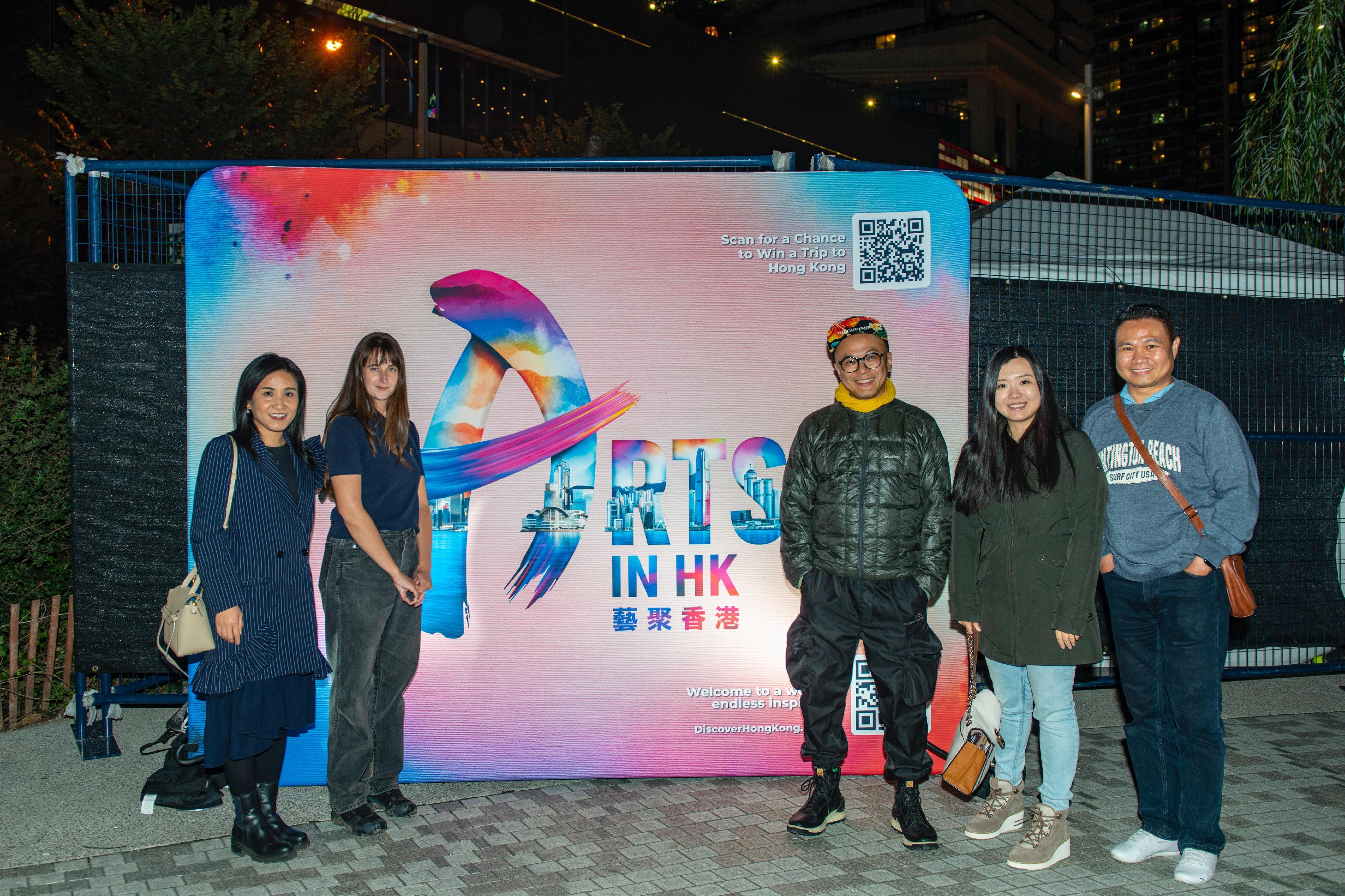 Hong Kong digital media artist Dr Hung Keung is shown with the Director of the Hong Kong Economic and Trade Office (Toronto) Ms Emily Mo, Canadian dance artist Lauren Runions and other guests on October 5 (Toronto time) at Nuit Blanche, at Love Park in Toronto, Canada.