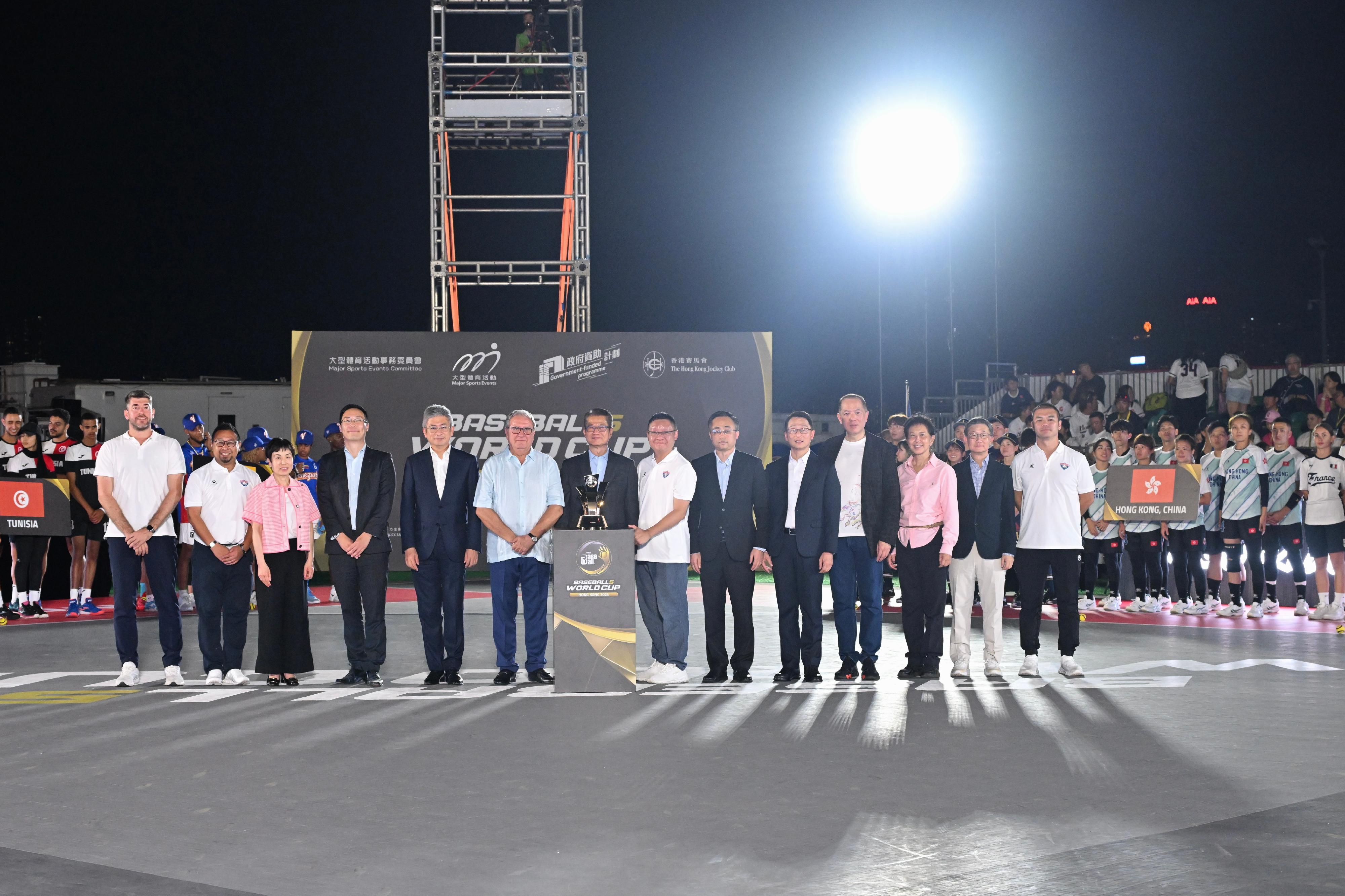 The Financial Secretary, Mr Paul Chan, attended the opening ceremony of the WBSC Baseball5 World Cup 2024 today (October 7). Photo shows (from fifth left) the Acting Secretary for Culture, Sports and Tourism, Mr Raistlin Lau; the President of the World Baseball Softball Confederation, Mr Riccardo Fraccari; Mr Chan; the President of the Baseball Association of Hong Kong, China, Mr Andrew Fan, and other guests at the opening ceremony.