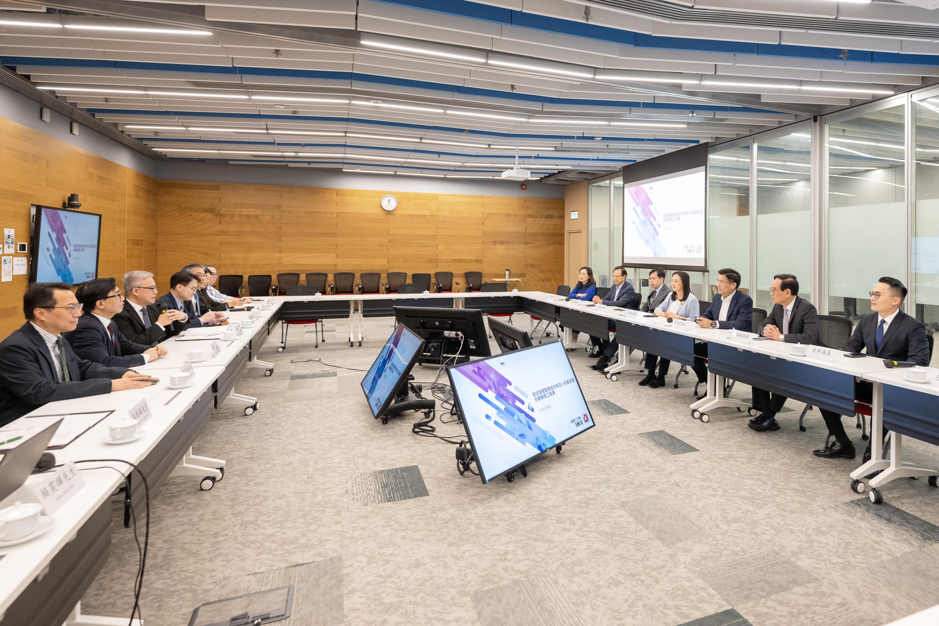 The Legislative Council Subcommittee on Matters Relating to the Development of Smart City visited the Electrical and Mechanical Services Department (EMSD) Headquarters today (October 8). Photo shows Members receiving a briefing by representatives of the EMSD on its innovation and technology initiatives to help government departments and public organisations improve their services.