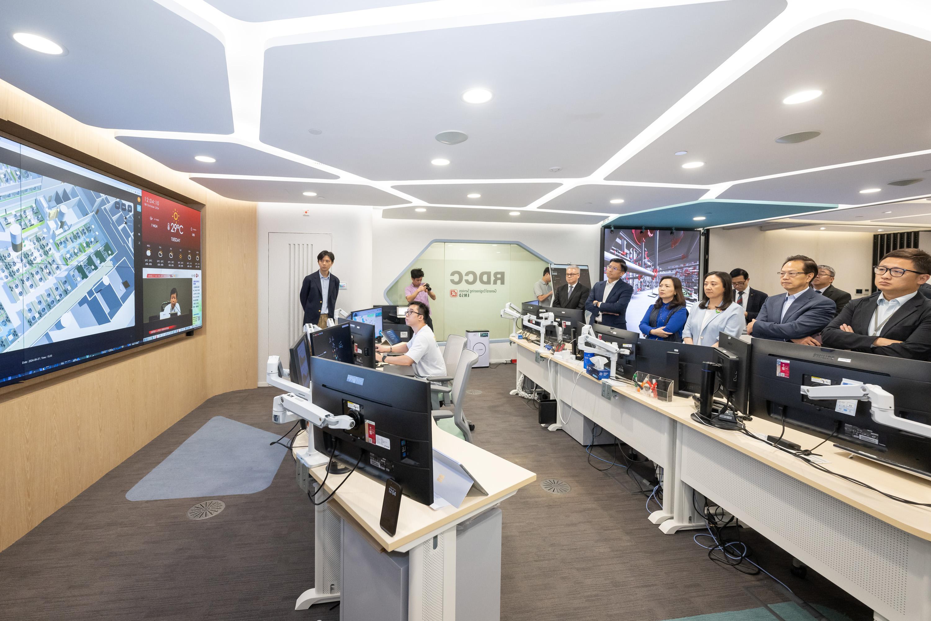 The Legislative Council (LegCo) Subcommittee on Matters Relating to the Development of Smart City visited the Electrical and Mechanical Services Department Headquarters today (October 8). Photo shows LegCo Members touring the Regional Digital Control Centre.