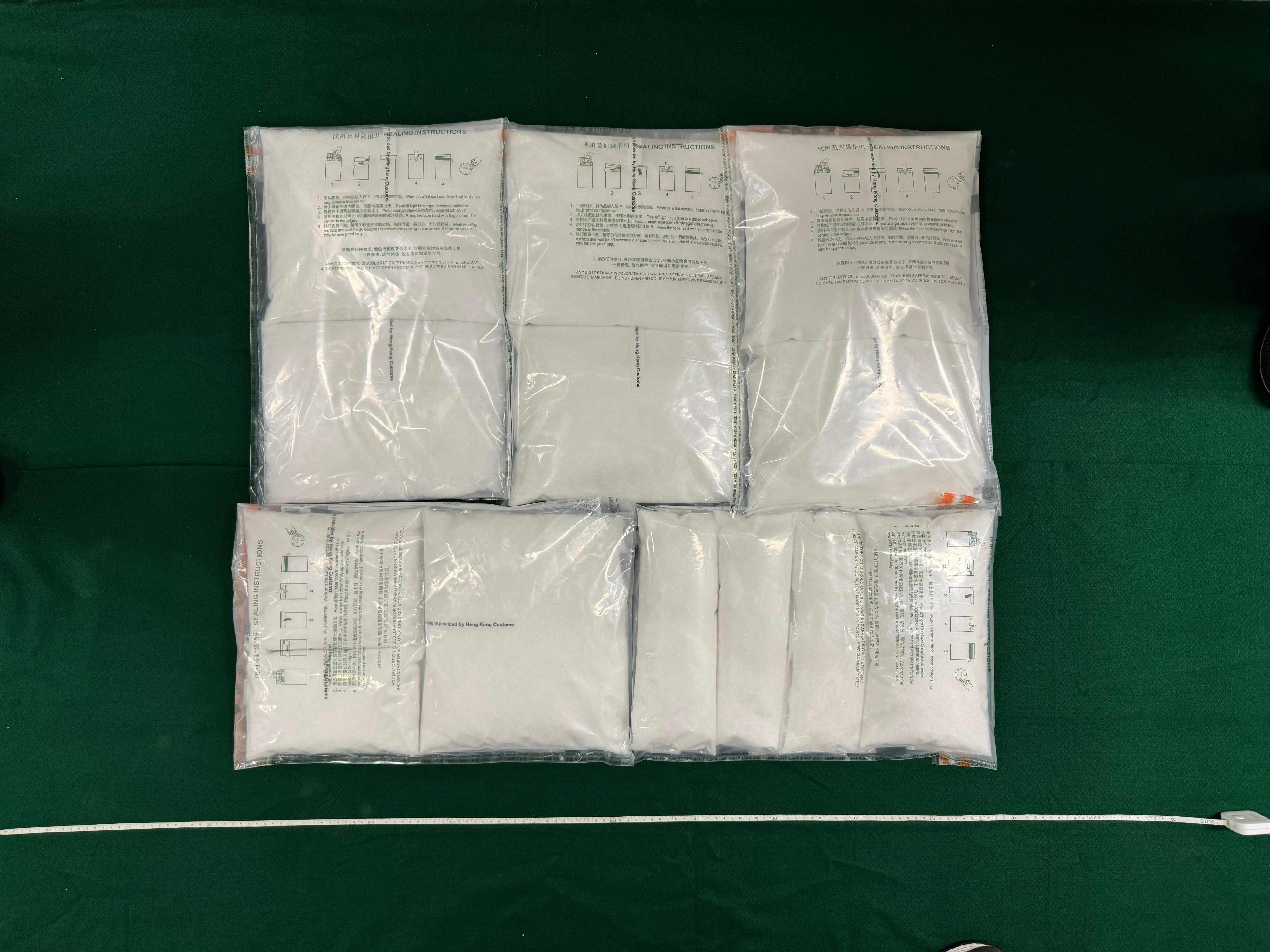 Hong Kong Customs effected two dangerous drug trafficking cases between October 7 and yesterday (October 9), and seized about 24.5 kilograms of suspected ketamine with an estimated market value of about $12 million. Photo shows the suspected ketamine seized in the first case.