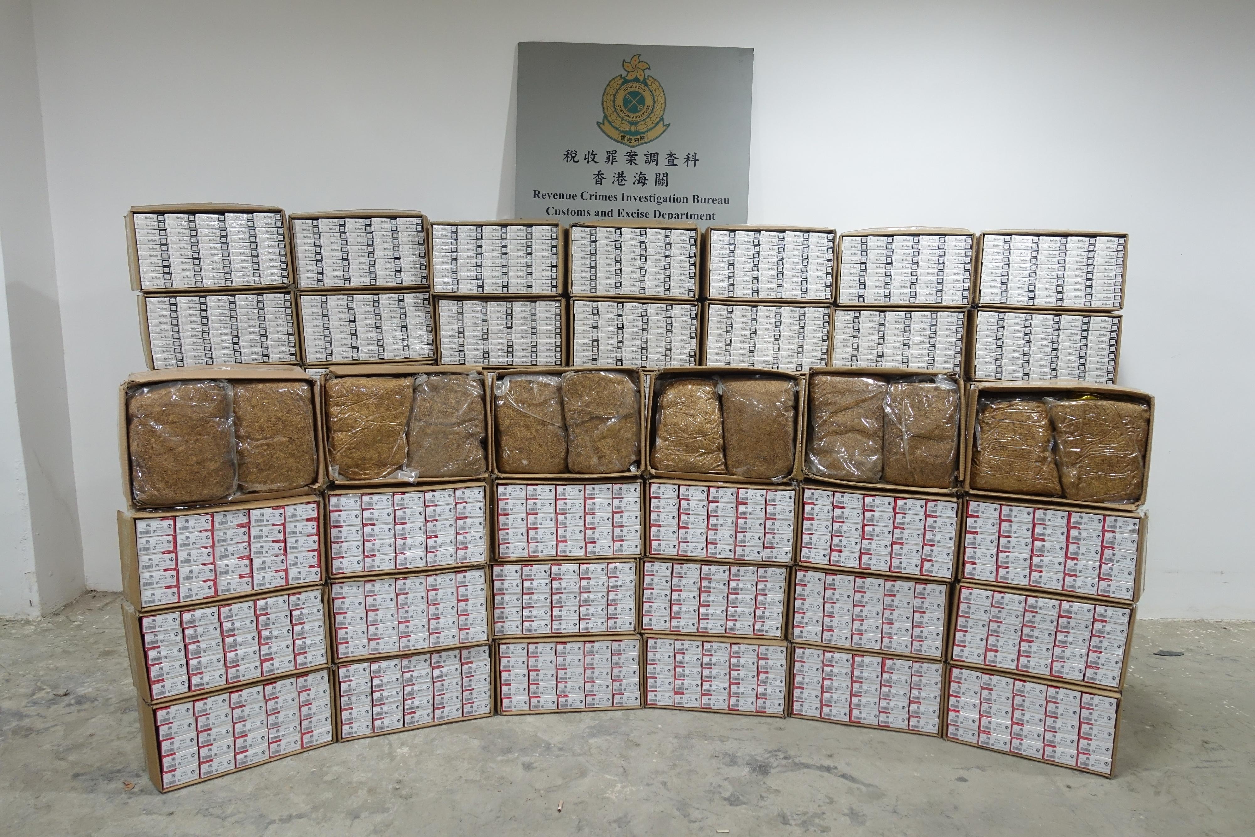 Hong Kong Customs yesterday (October 9) raided a suspected illicit cigarette and manufactured tobacco storage centre in Tsuen Wan and seized about 2.3 million suspected illicit cigarettes and about 280 kilograms of suspected duty-not-paid manufactured tobacco, with an estimated market value of about $12.3 million and a duty potential of about $8.8 million. Photo shows the suspected illicit cigarettes and duty-not-paid manufactured tobacco seized.
