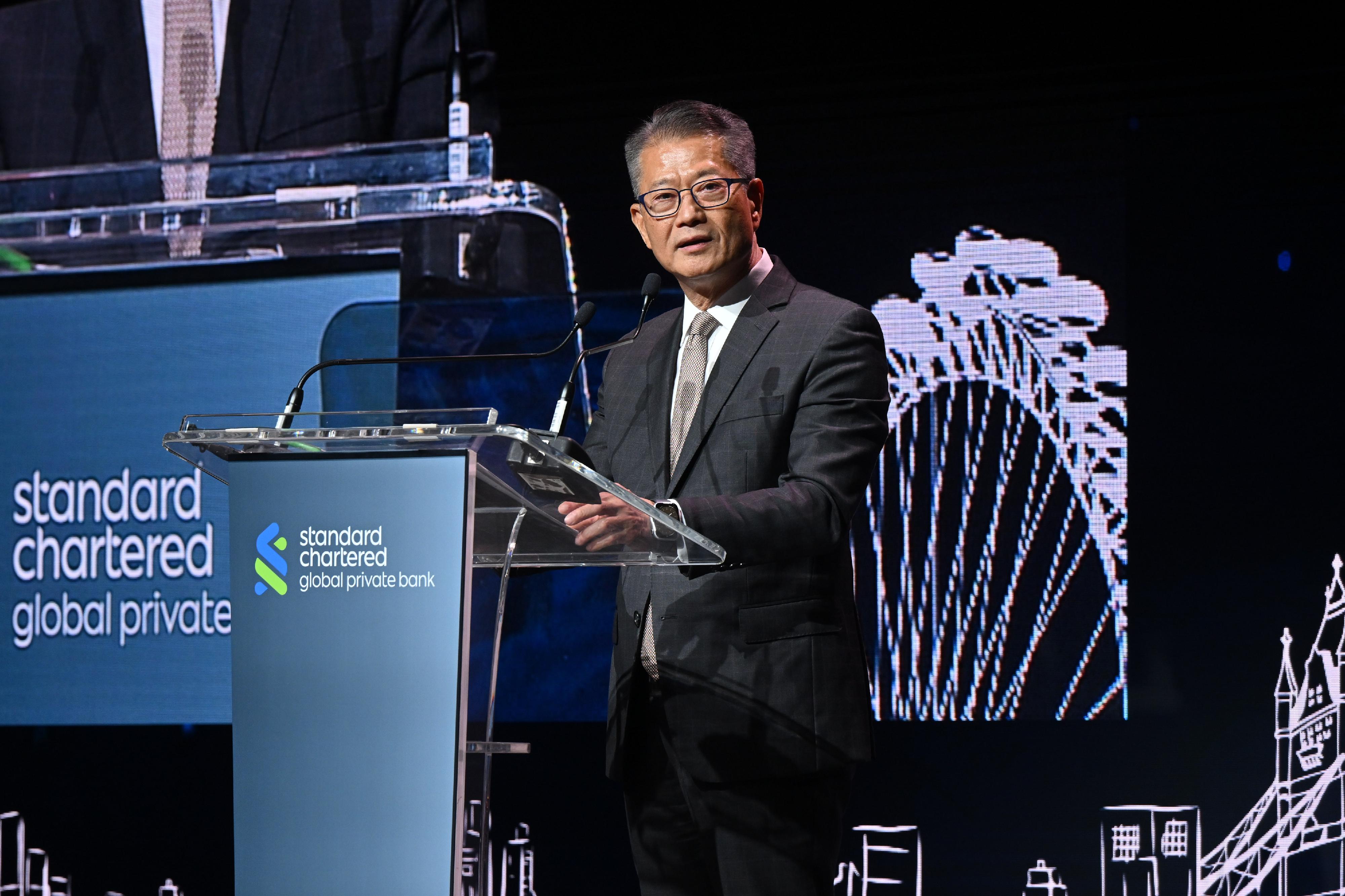 The Financial Secretary, Mr Paul Chan, speaks at the welcome dinner for the Standard Chartered Private Bank Global Family Network 2024 this evening (October 15).