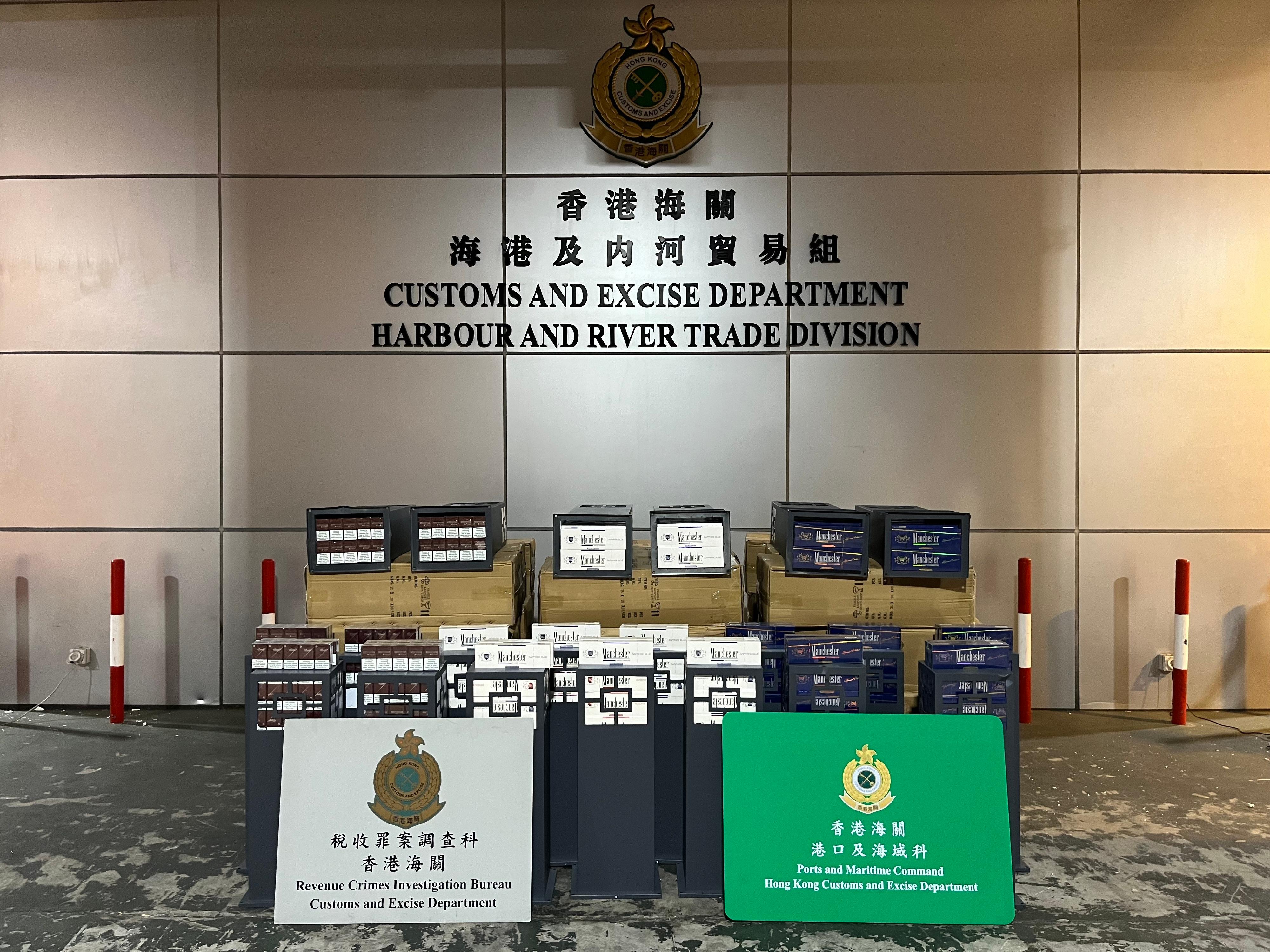 Hong Kong Customs detected four illicit cigarette smuggling cases from September 25 to October 4. A total of about 7.4 million of suspected illicit cigarettes with an estimated market value of about $33 million and a duty potential of about $25 million in total were seized. Photo shows some of the illicit cigarettes seized.