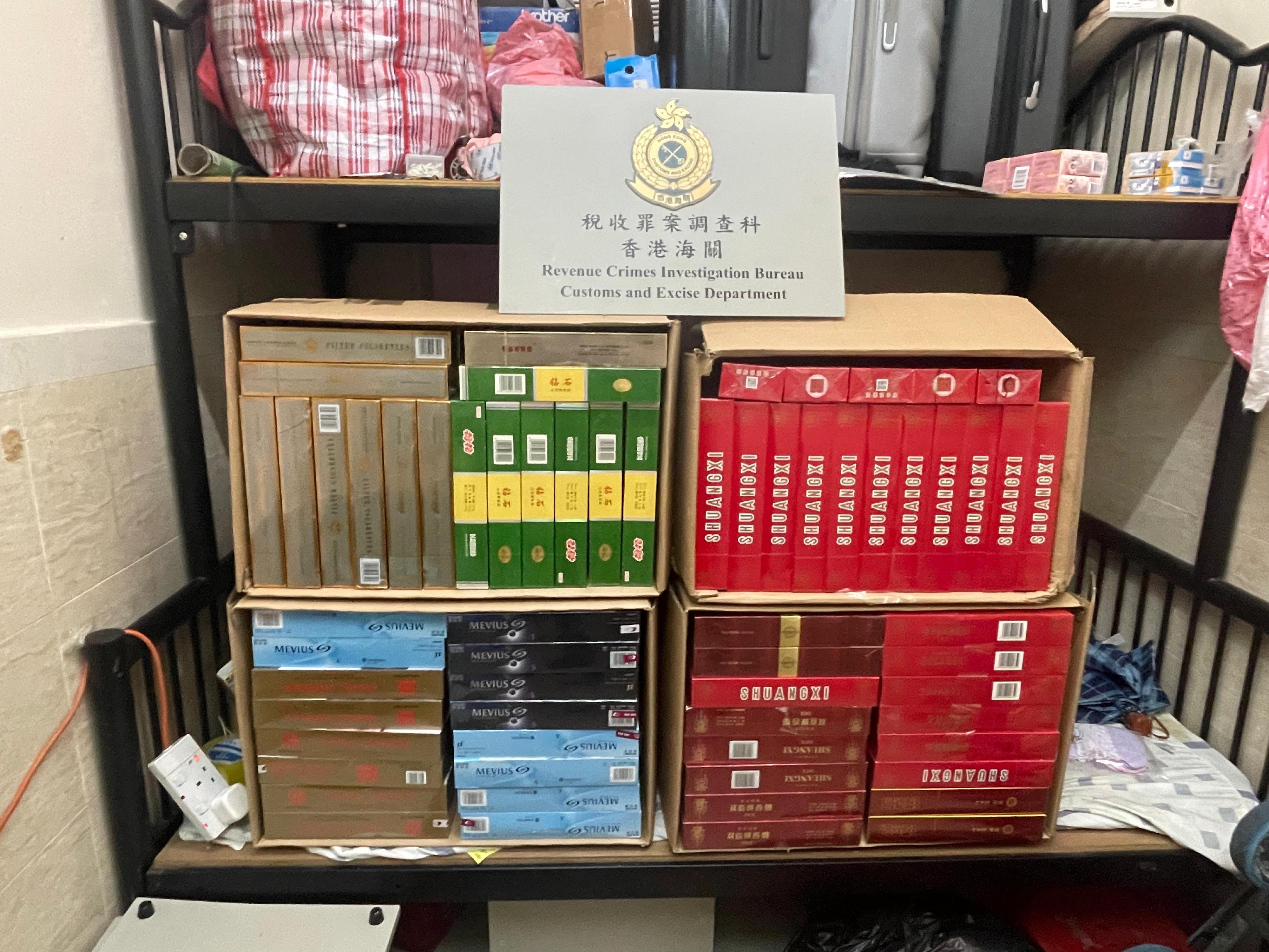 Hong Kong Customs today (October 16) conducted anti-illicit cigarette operations in Hung Hom, Kwun Tong and Wong Tai Sin, shutting down two suspected illicit cigarette storage centres and detecting a case involving an illicit cigarette distribution vehicle. A total of about 183 000 suspected illicit cigarettes, with a total estimated market value of about $820,000 and a duty potential of about $600,000, were seized. Photo shows the suspected illicit ciagrettes seized in the second case.