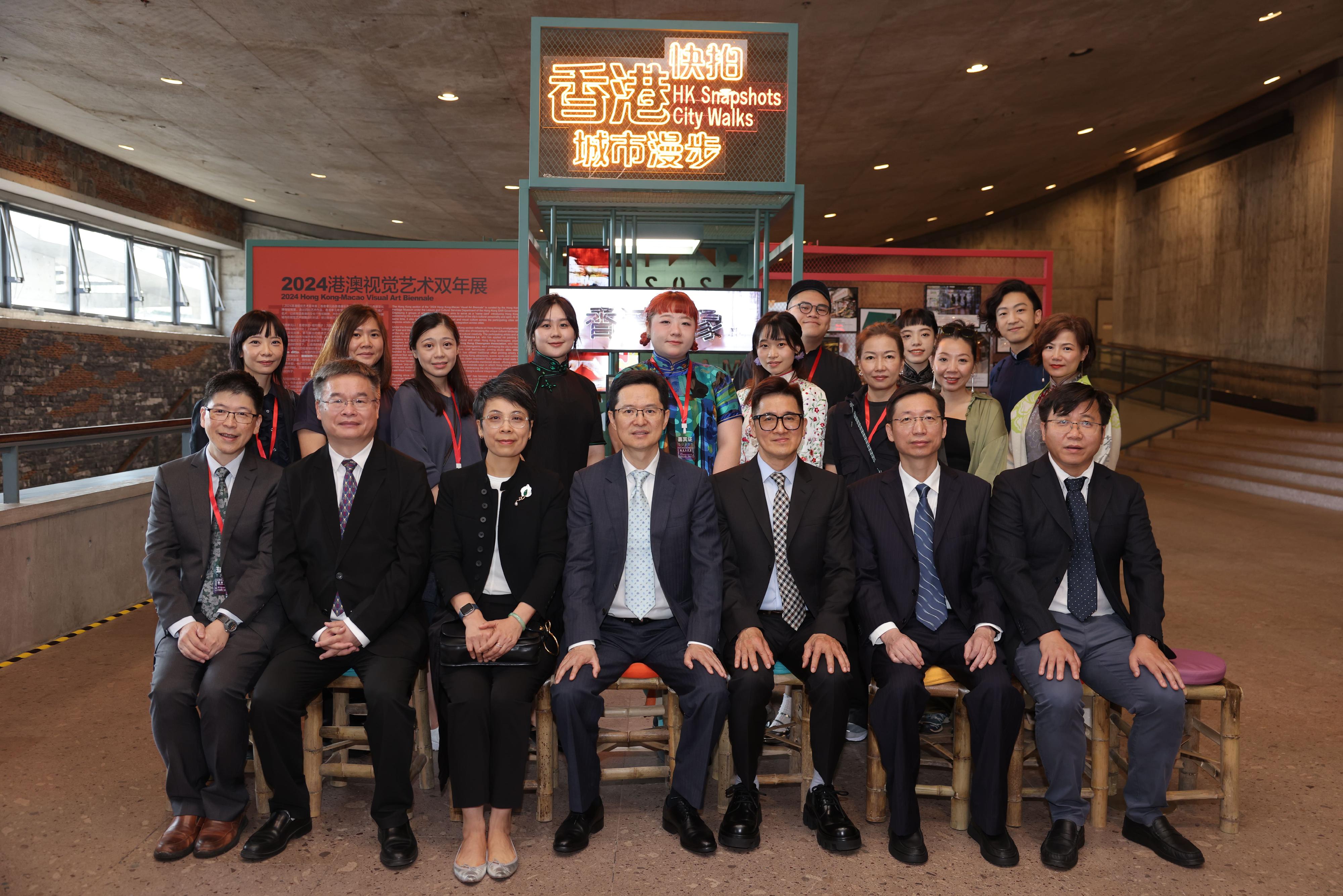 The 2024 Hong Kong-Macao Visual Art Biennale is currently on display at the Gongwang Art Museum in Fuyang, Hangzhou. Photo shows (first row, from left) the Curator of the Hong Kong Heritage Museum, Dr Raymond Tang; the Director and Executive Vice President of China Arts and Entertainment Group Ltd, Guo Liqun; the Deputy Director of Leisure and Cultural Services (Culture), Miss Eve Tam; Deputy Director of the Department of Hong Kong, Macao and Taiwan Affairs of the Ministry of Culture and Tourism of the People's Republic of China Mr Kong Lun; the Vice President of the Cultural Affairs Bureau of the Macao Special Administrative Region, Mr Cheang Kai Meng; Deputy Director of the Department of Culture and Tourism of Zhejiang Province Mr Chan Rufu; and member of the Standing Committee of the Communist Party of China Hangzhou Fuyang District and the Director of the Propaganda Department, Mr Zhang Peng, along with the participating Hong Kong artists at the Hong Kong exhibition section.