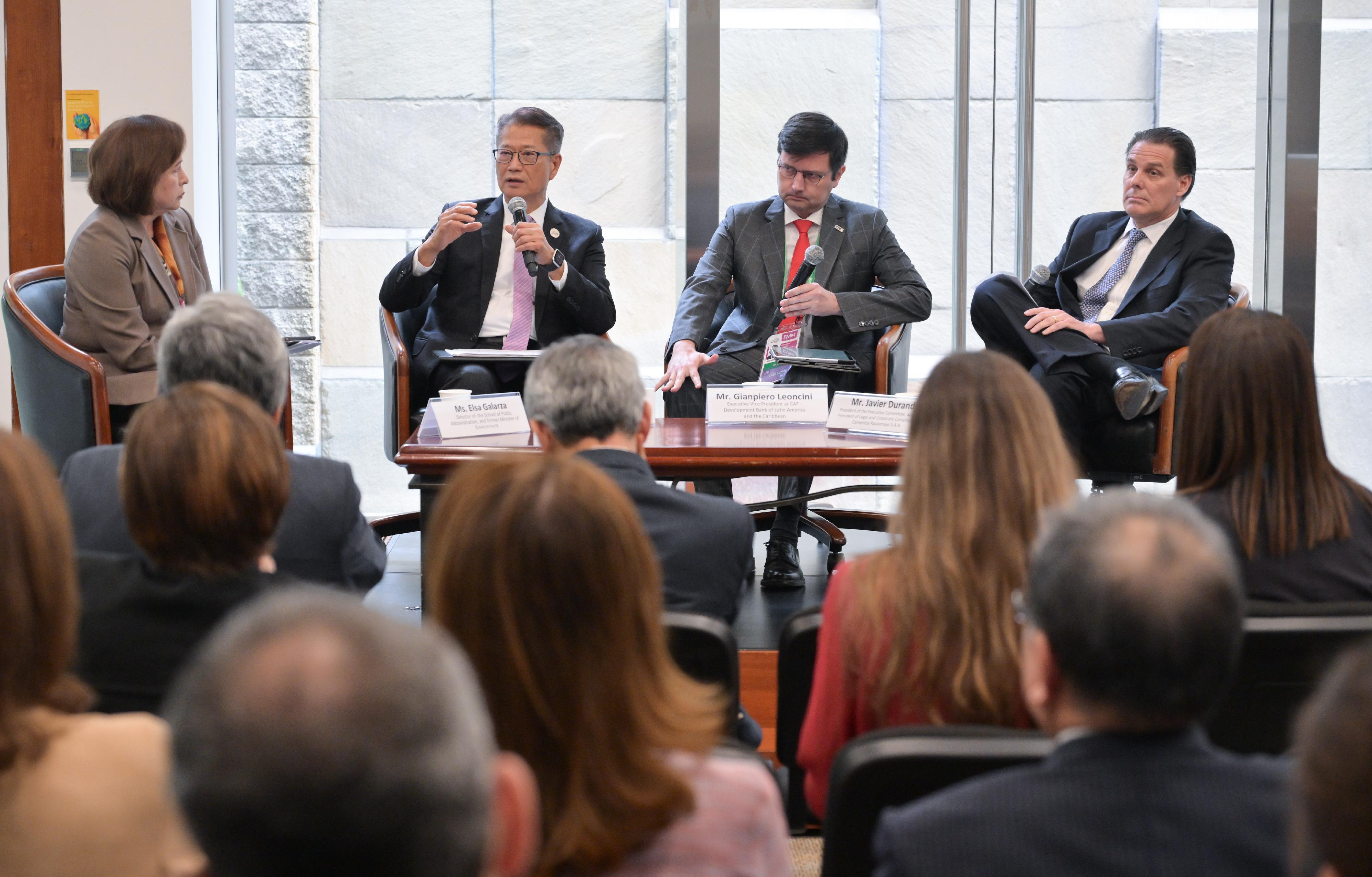 The Financial Secretary, Mr Paul Chan, began his visit to Lima, Peru, yesterday (October 20, Lima time) to attend the Asia-Pacific Economic Cooperation (APEC) Finance Ministers' Meeting (FMM) and related activities. Photo shows Mr (second left) speaking at the High Level Event on Sustainable Finance during FMM.