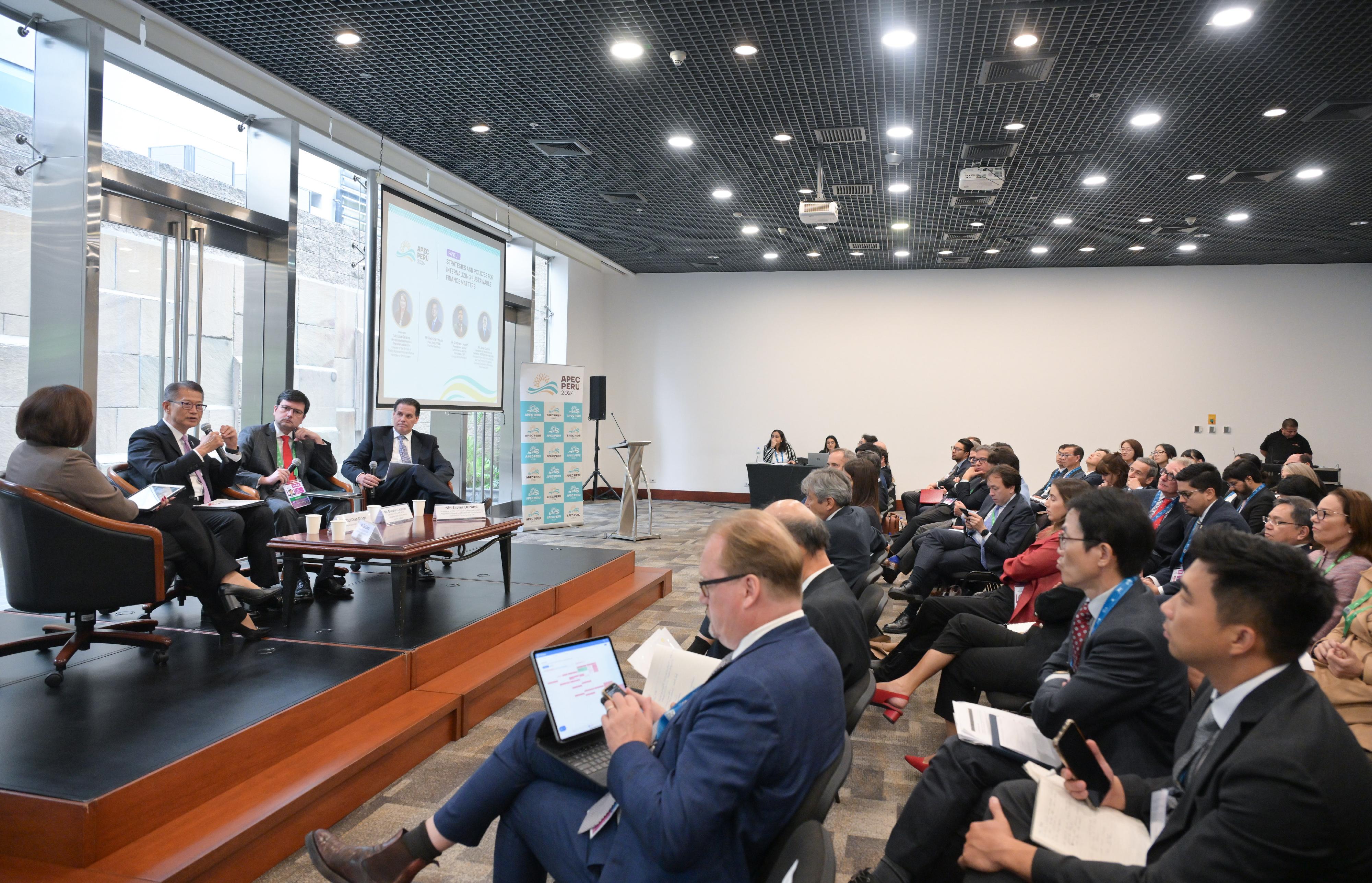 The Financial Secretary, Mr Paul Chan, began his visit to Lima, Peru, yesterday (October 20, Lima time) to attend the Asia-Pacific Economic Cooperation (APEC) Finance Ministers' Meeting (FMM) and related activities. Photo shows Paul Chan (second left) speaking at High Level Event on Sustainable Finance during FMM.