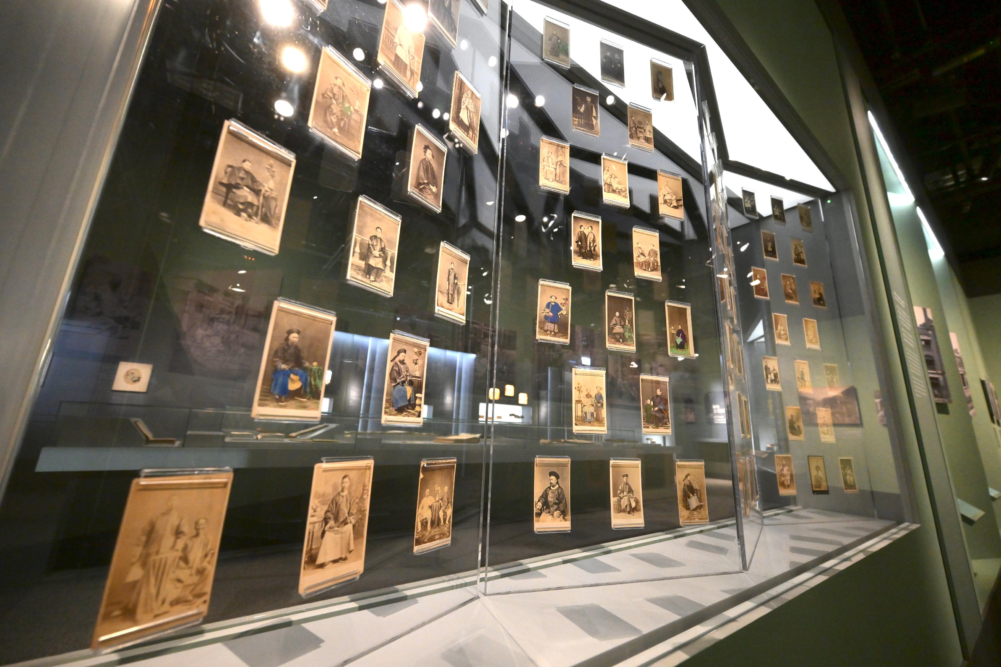 The ceremony of the Moonchu Collection donation, gallery naming and opening of the "In Retrospect: The Early Chinese Photography Collection of Moonchu Foundation" exhibition was held today (October 22) at the Hong Kong Museum of History. Photo shows a display of photos known as "Cartes de visite" in the size of a calling card, which sparked a social trend in 19th century.