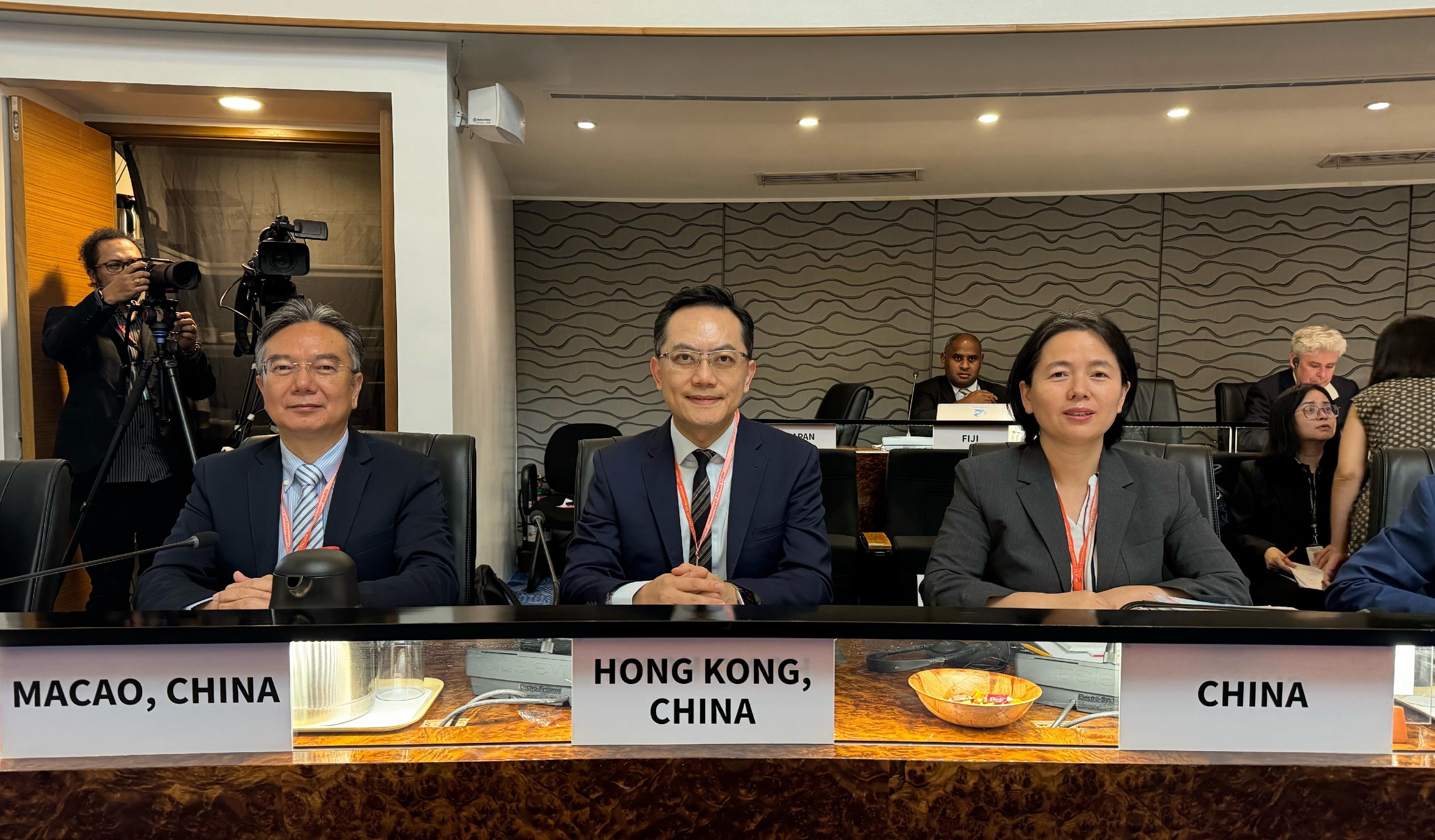 The Director of Health, Dr Ronald Lam, is leading a delegation from the Department of Health to attend the meeting of the 75th session of the World Health Organization Regional Committee for the Western Pacific, which is being held from October 21 to 25, in Manila, the Philippines. Photo shows Dr Lam (centre) attending the meeting with deputy director of the National Health Commission's International Cooperation Department Ms Li Juan (right) and Subdirector of the Health Bureau of the Macao Special Administrative Region Government Mr Chan Weng-wa (left).