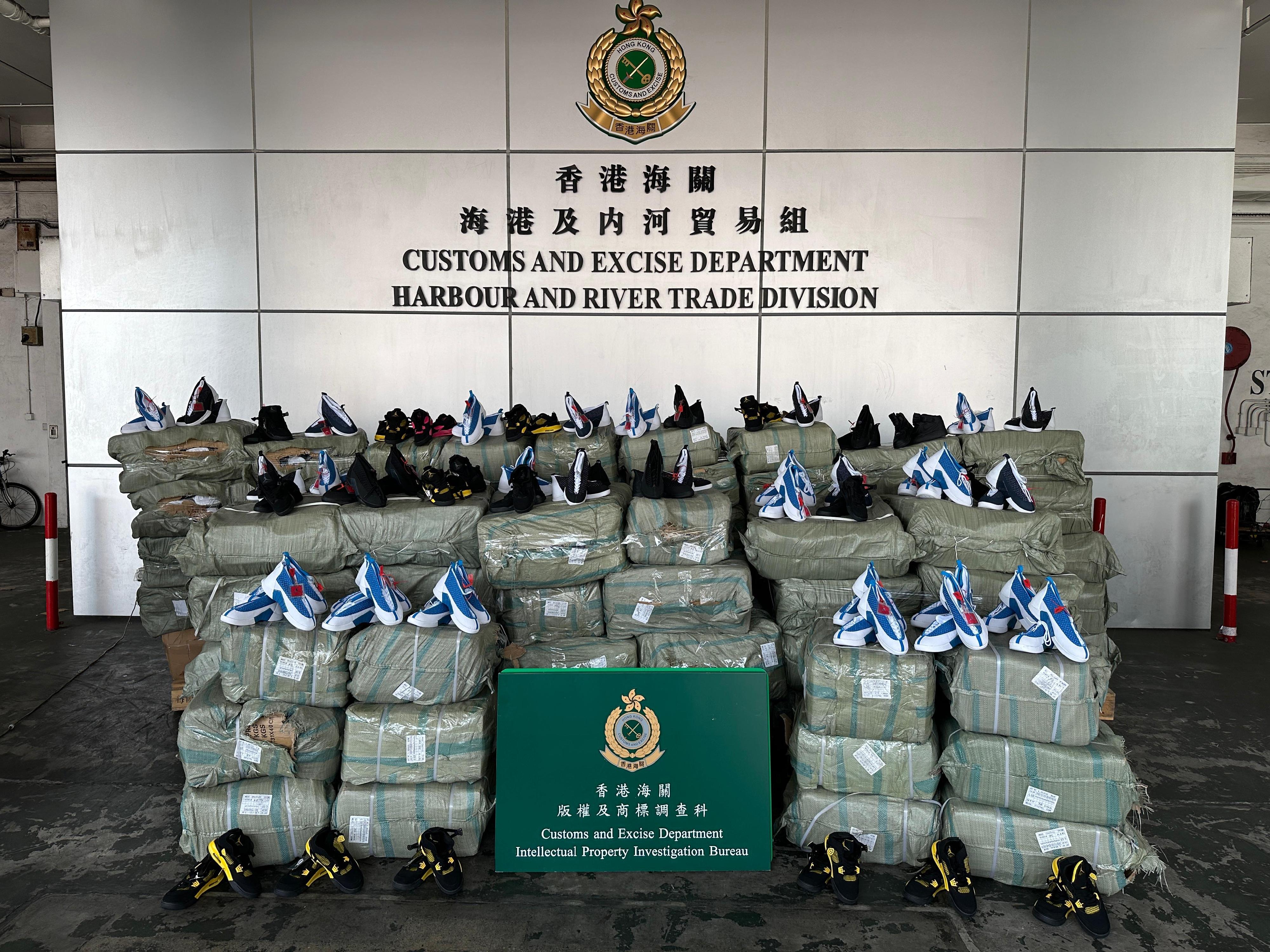 Hong Kong Customs from October 9 to 16 seized about 74 700 items of suspected counterfeit goods at the Tuen Mun River Trade Terminal Customs Cargo Examination Compound. The total estimated market value of the seizure was about $14.9 million. Photo shows some of the suspected counterfeit sports shoes seized.