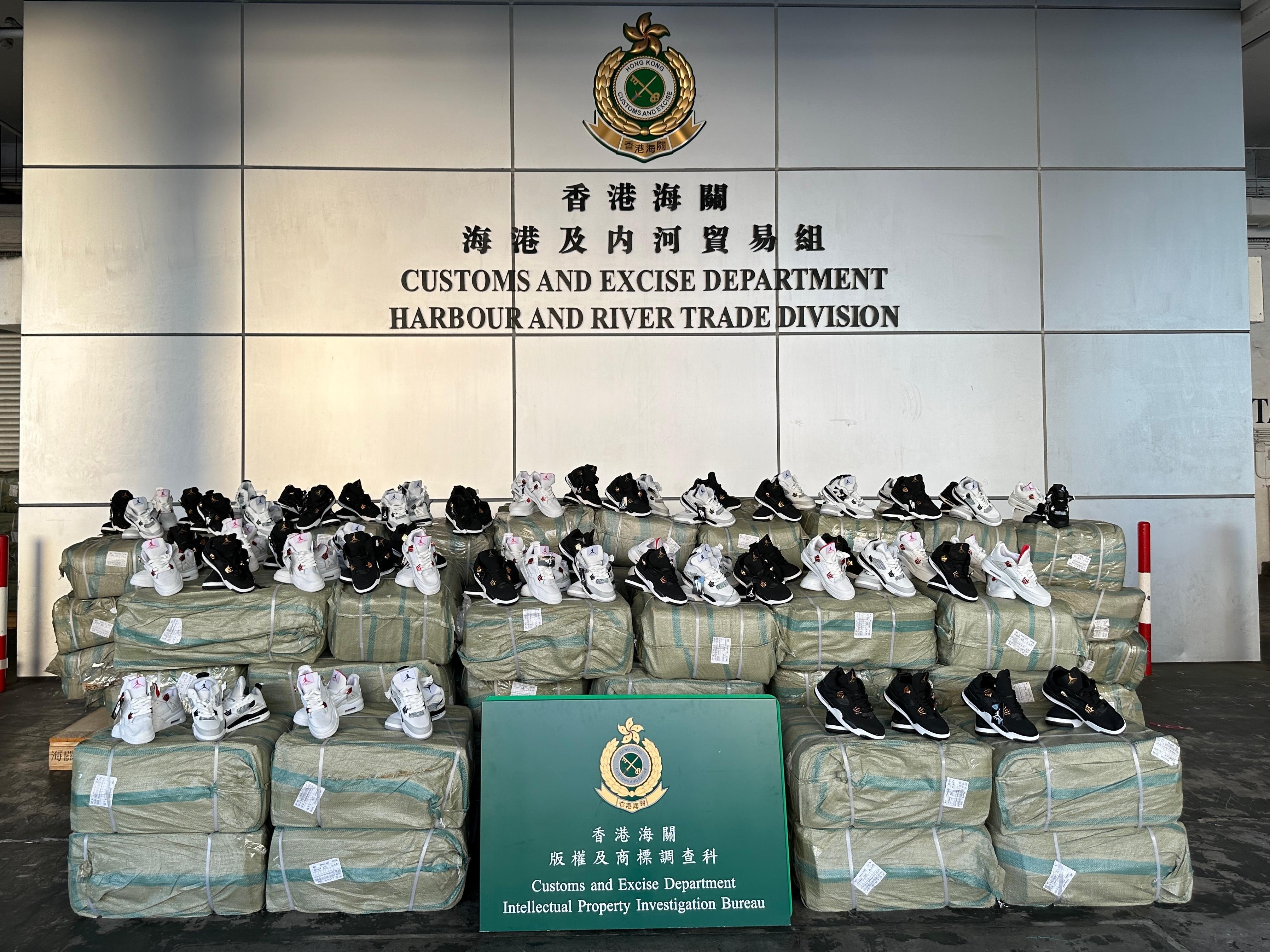 Hong Kong Customs from October 9 to 16 seized about 74 700 items of suspected counterfeit goods at the Tuen Mun River Trade Terminal Customs Cargo Examination Compound. The total estimated market value of the seizure was about $14.9 million. Photo shows some of the suspected counterfeit sports shoes seized.