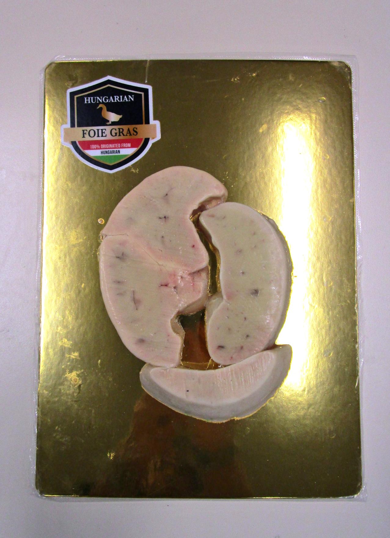 A food retailer was convicted of supplying and in possession of a kind of Chinese duck liver that was falsely claimed as "Hungarian goose liver", in contravention of the Trade Descriptions Ordinance, and was fined $30,000 at the Shatin Magistrates' Courts today (October 23). Photo shows the food product involved in the case.